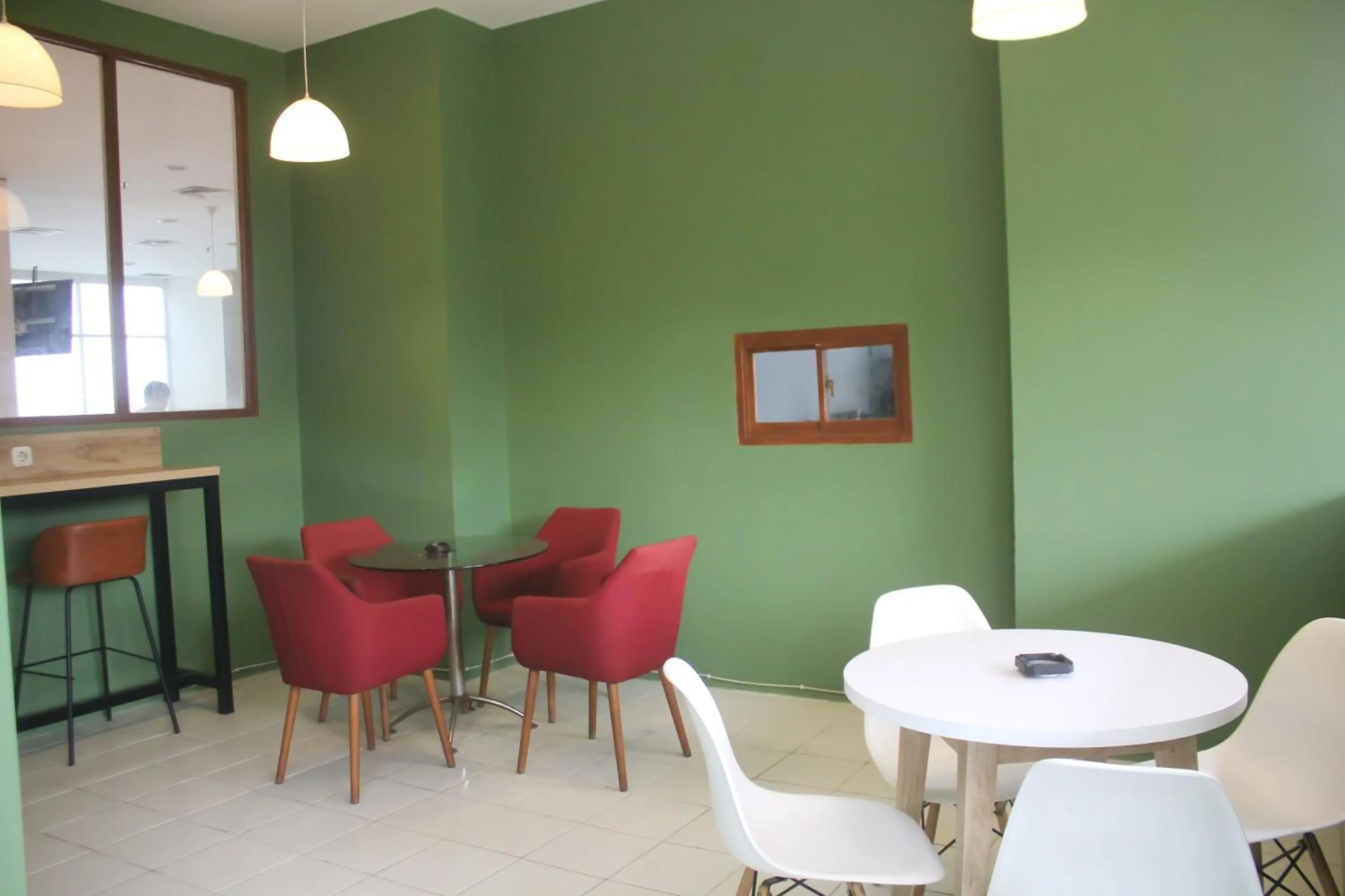 Seating area in Urban Hotel Serpong