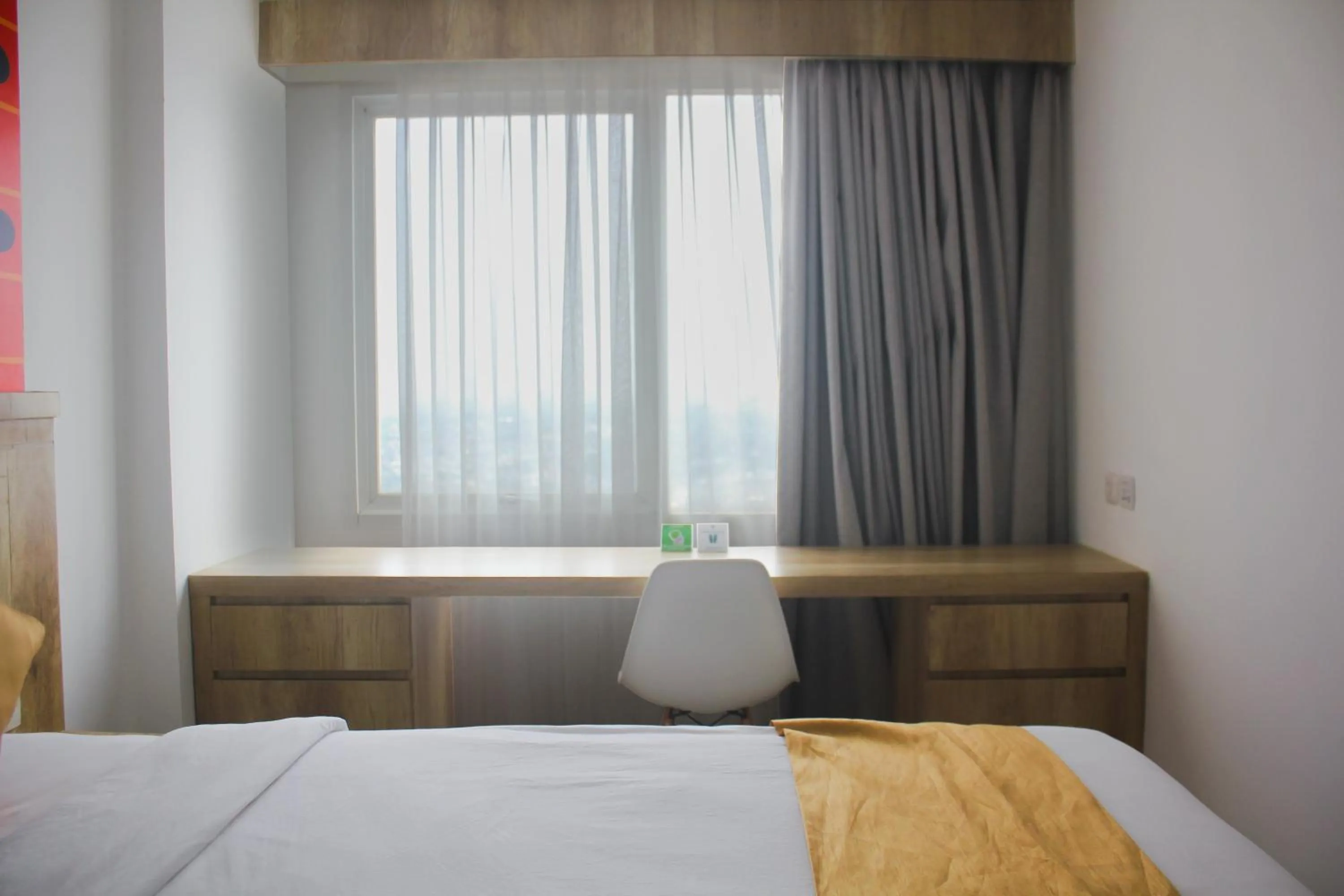 Bed in Urban Hotel Serpong