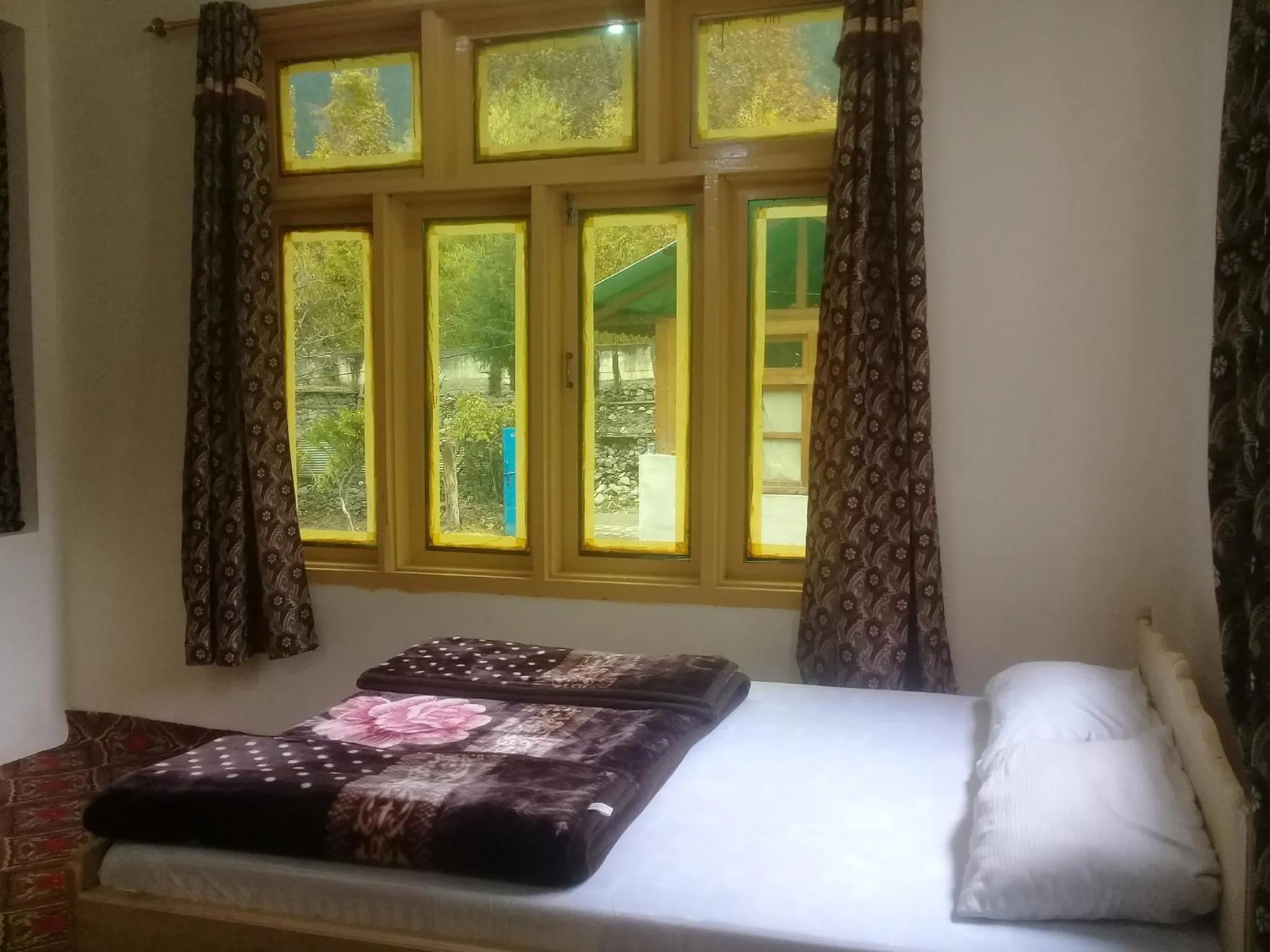 Bed in Benazir Hotel Kalash