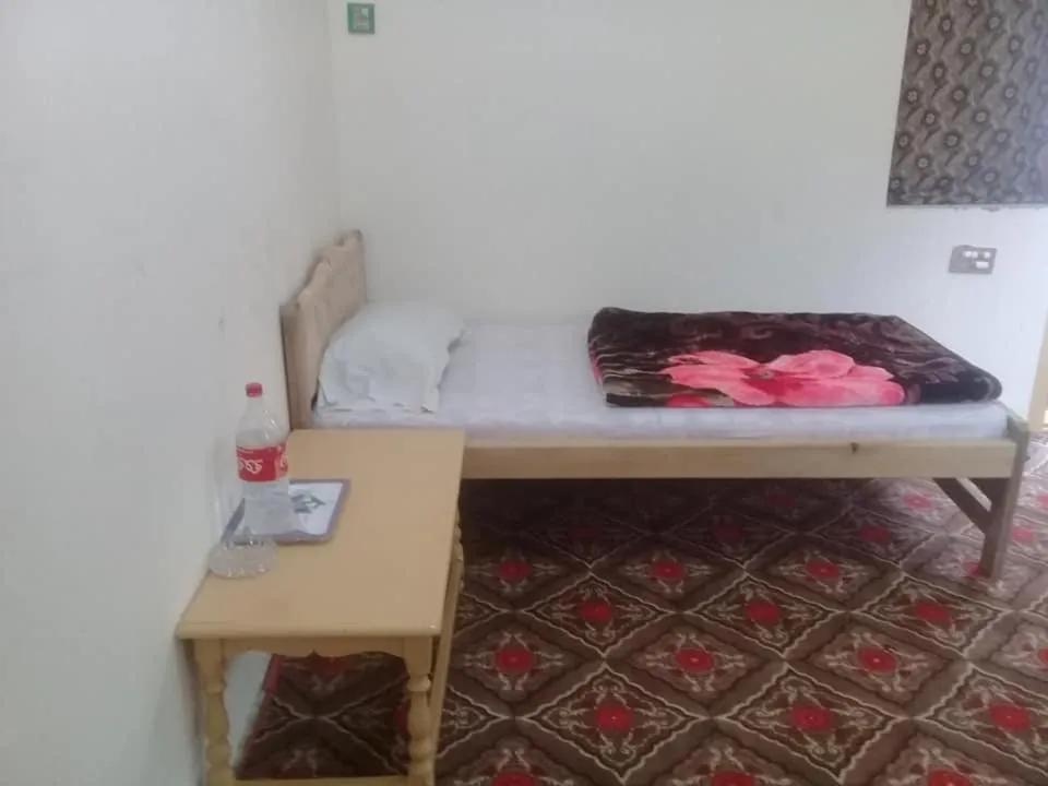 Bed in Benazir Hotel Kalash