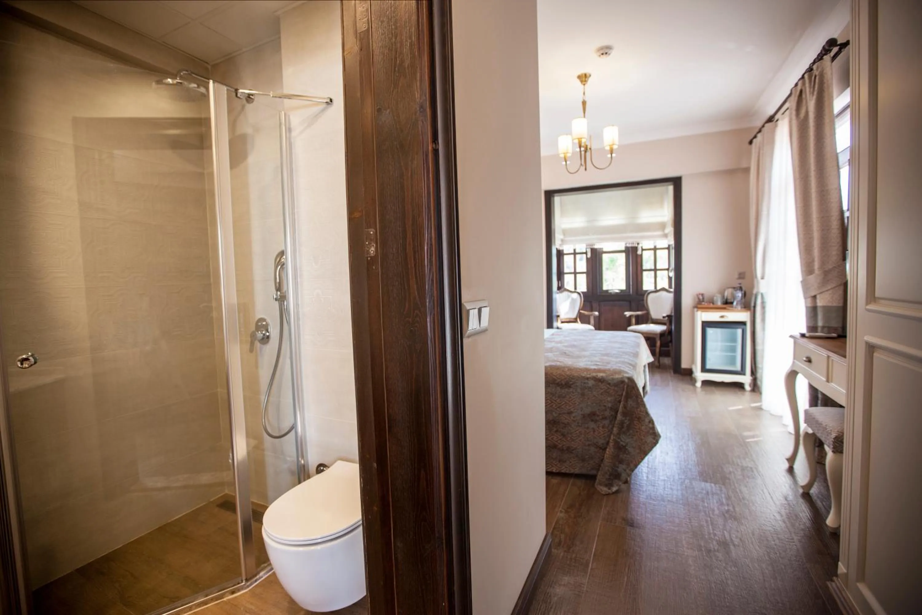 Bed in Livia Garden Hotel