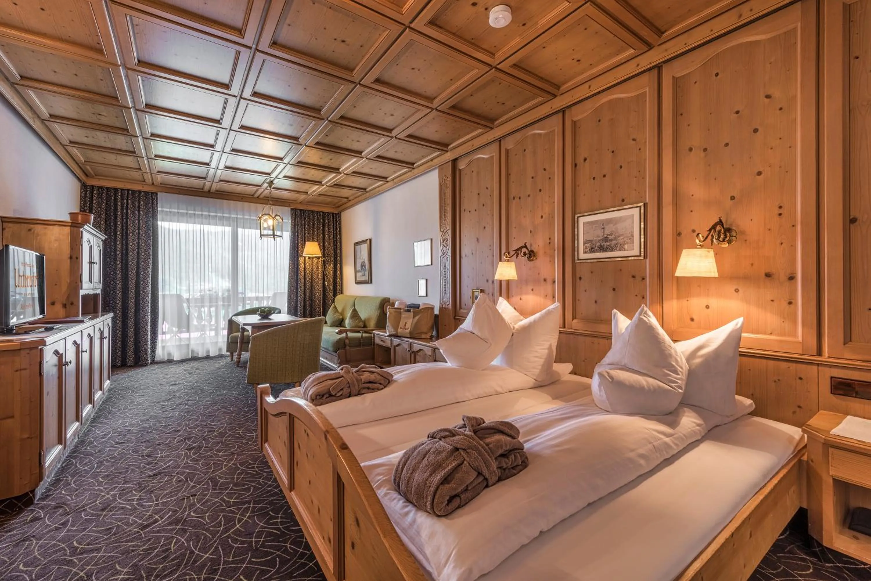 Seating area, Bed in Hotel Unterwirt