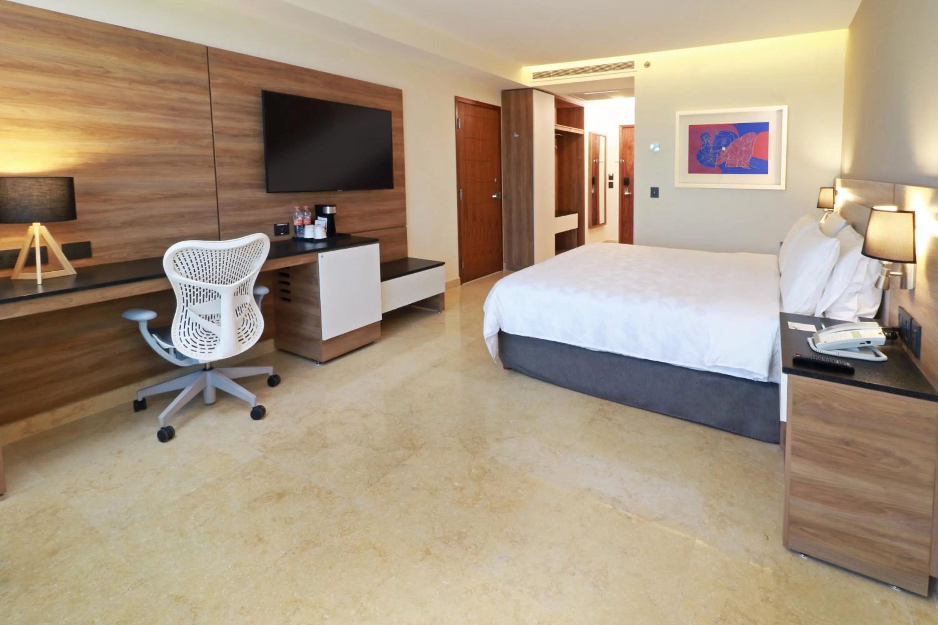 Photo of the whole room, Bed in Holiday Inn & Suites - Puerto Vallarta Marina & Golf by IHG