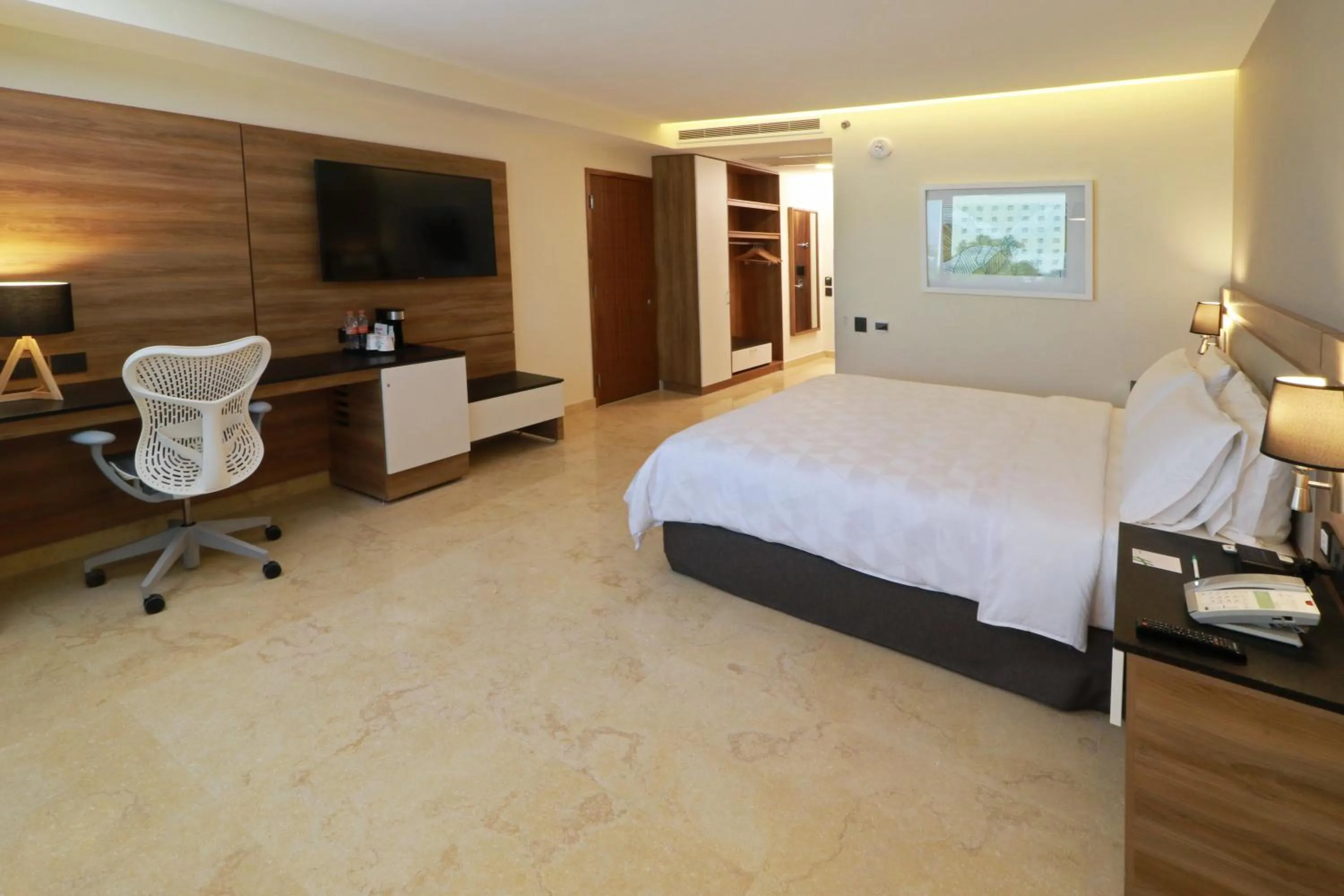Photo of the whole room, Bed in Holiday Inn & Suites - Puerto Vallarta Marina & Golf by IHG