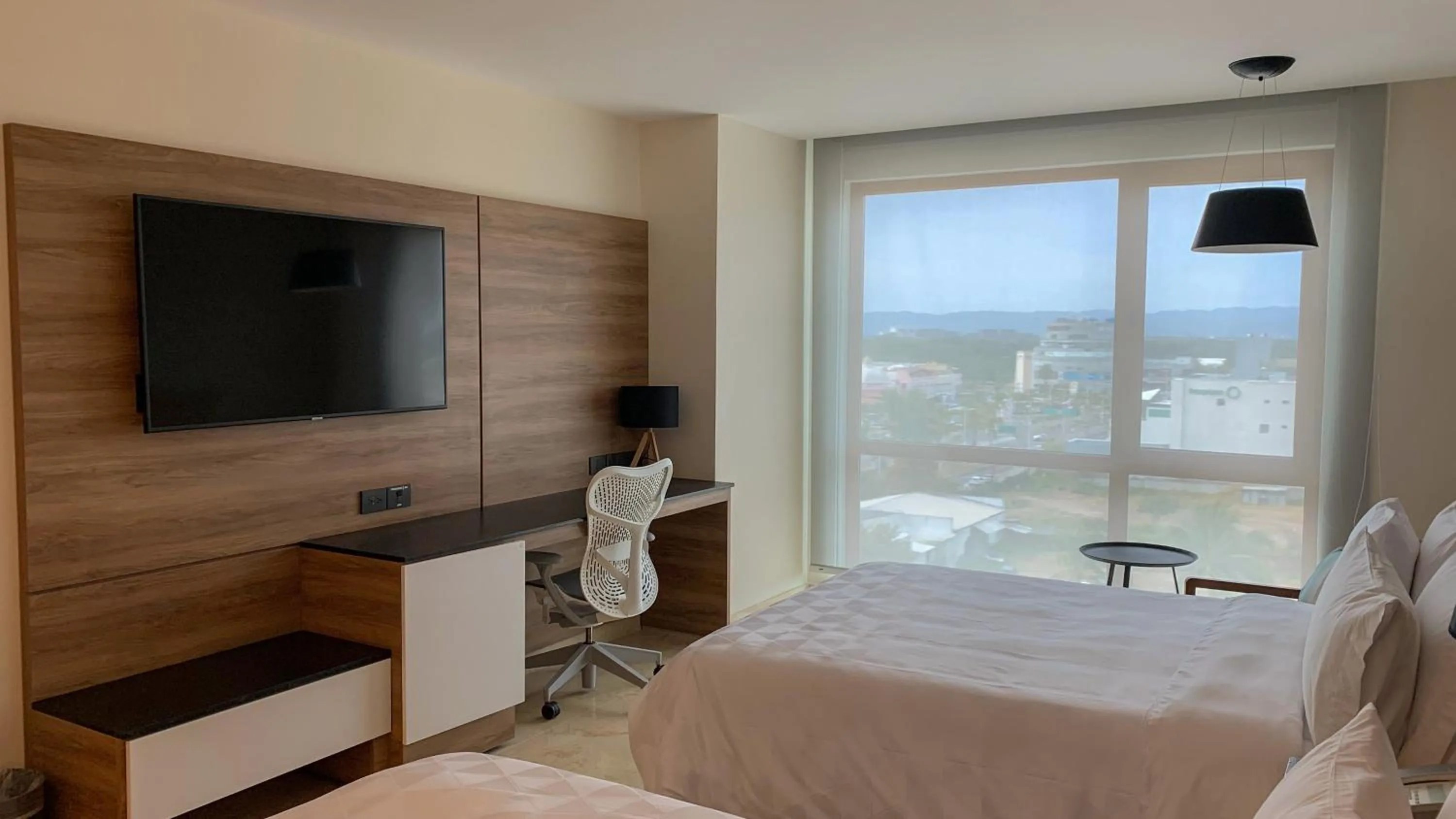 Photo of the whole room, Bed in Holiday Inn & Suites - Puerto Vallarta Marina & Golf by IHG