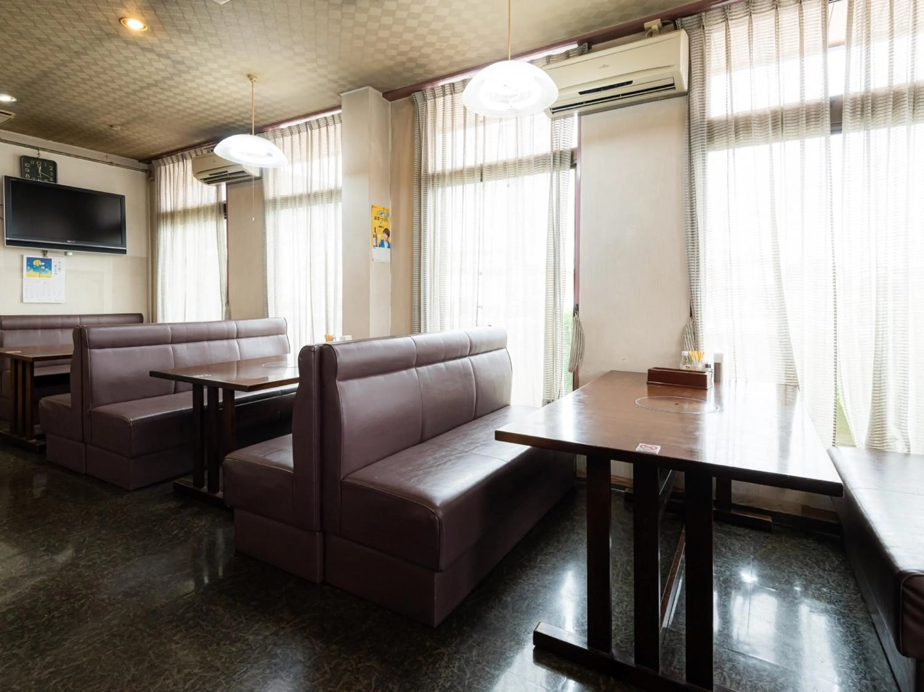 Communal lounge/ TV room in Tabist Hotel Kurama Hikone