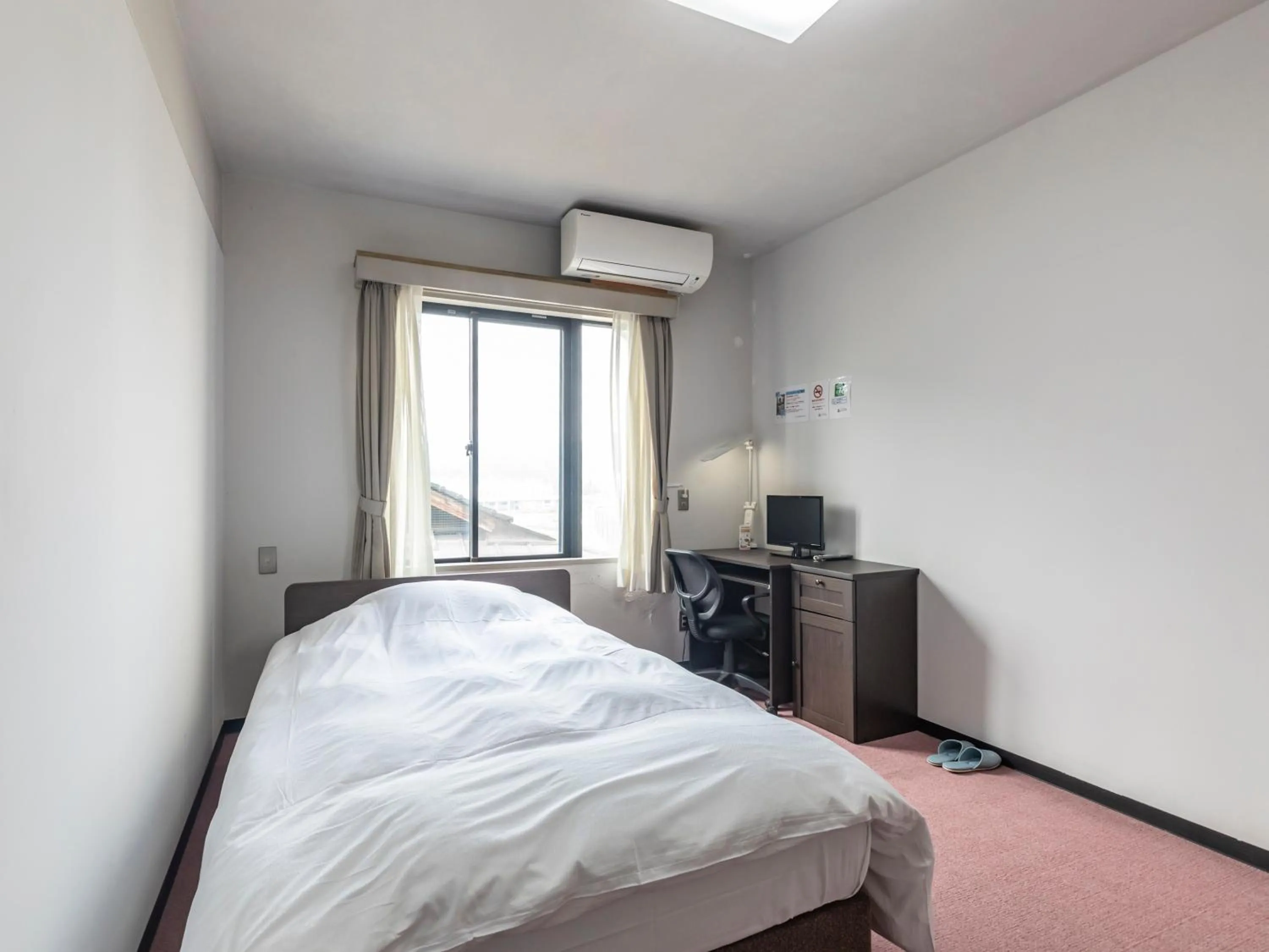 Bed in Tabist Raika Hiroshima Miyoshi