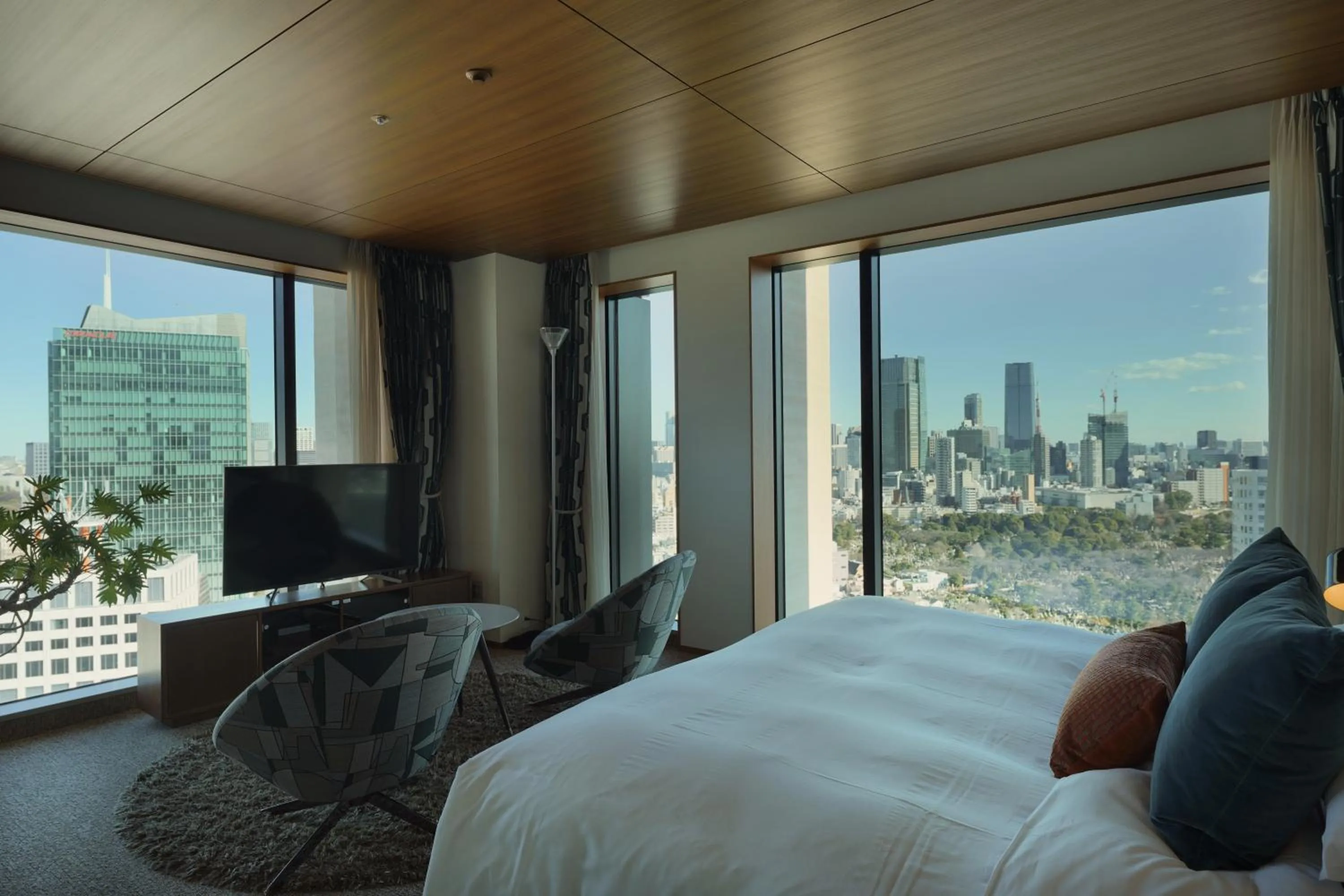 Bed in THE AOYAMA GRAND HOTEL