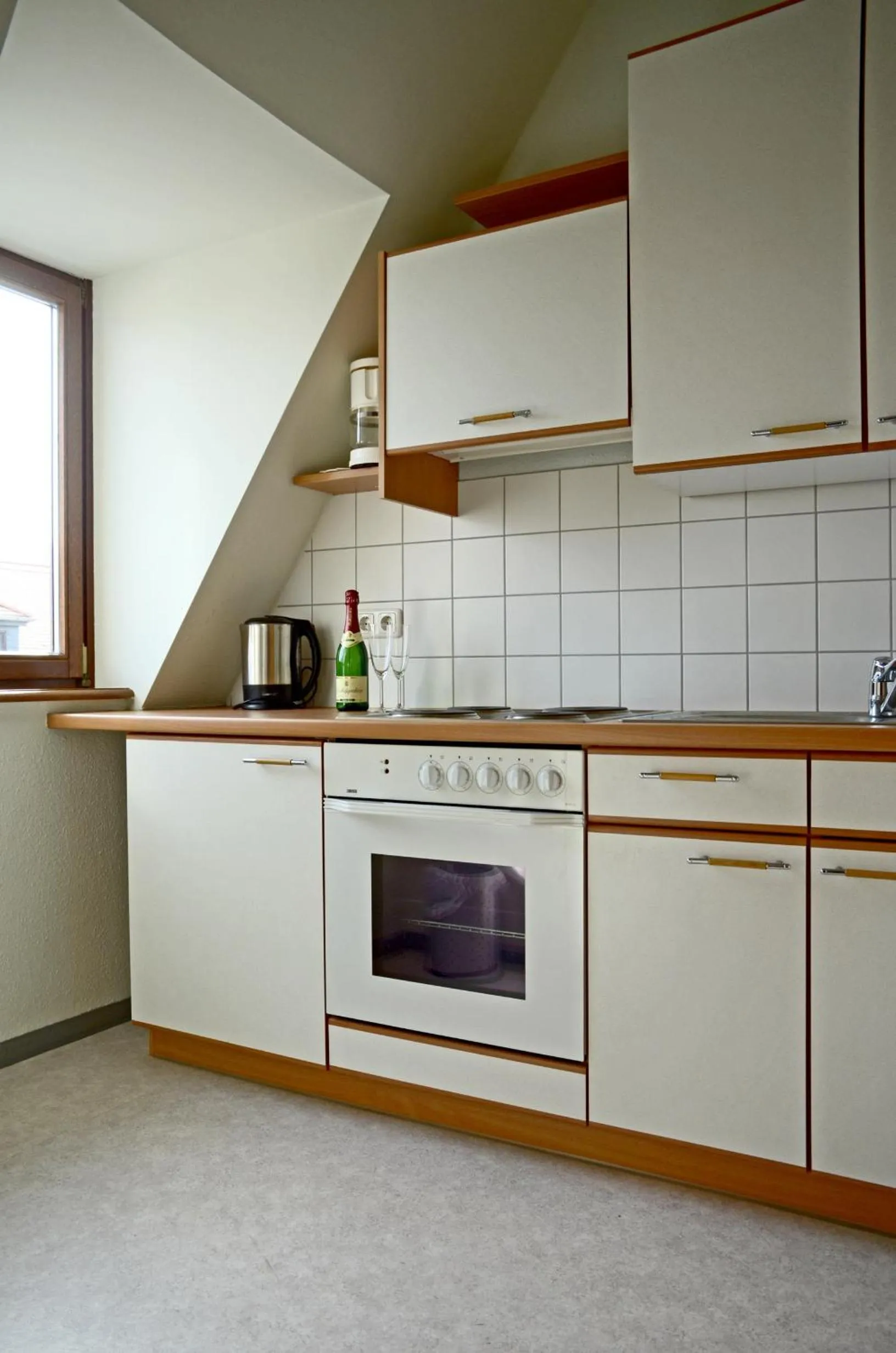 Kitchen or kitchenette in Hotel & Apartments Fürstenhof am Bauhaus