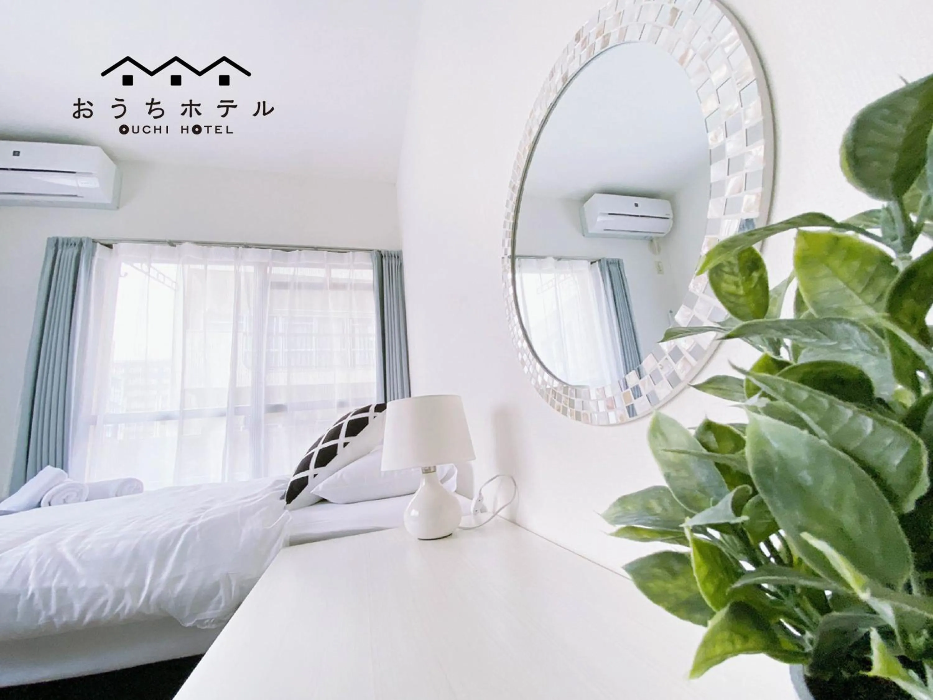 Bed in OUCHI HOTEL Itsukaichi