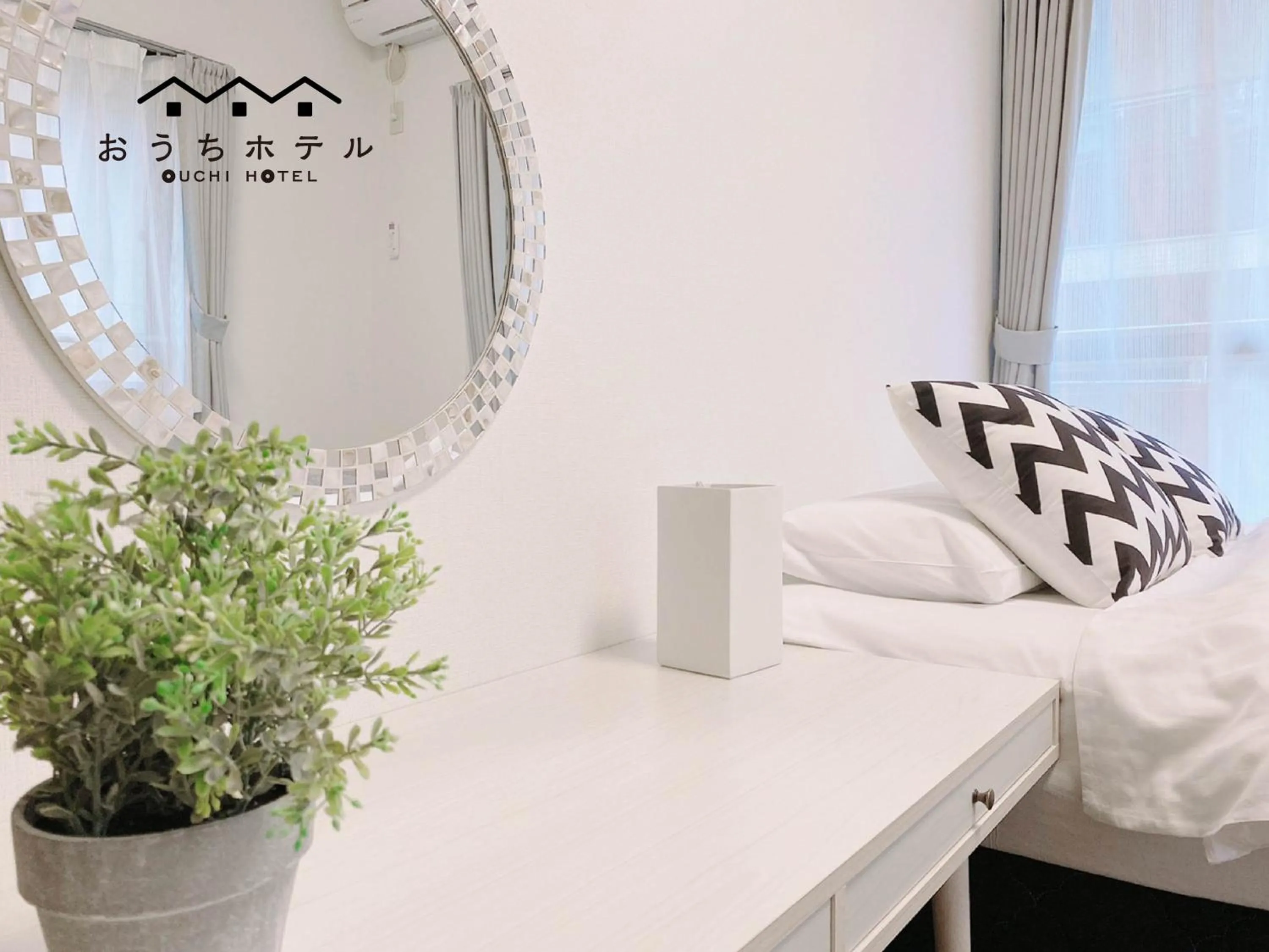 Bed in OUCHI HOTEL Itsukaichi