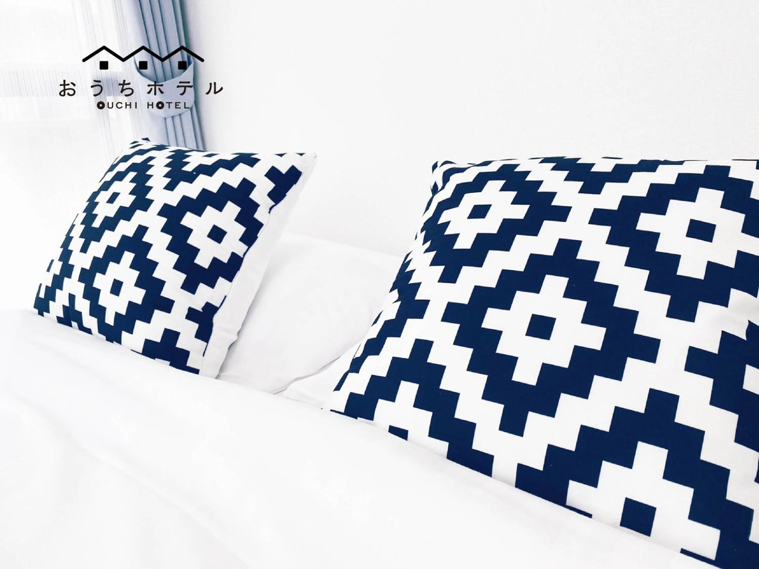 Bed in OUCHI HOTEL Itsukaichi