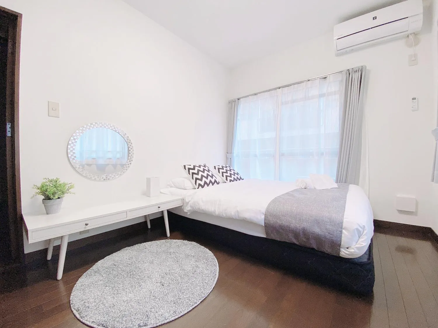 Bed in OUCHI HOTEL Itsukaichi