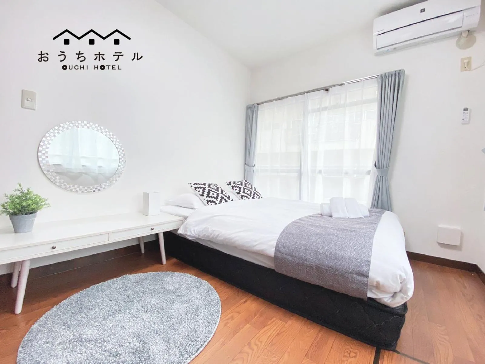 Bed in OUCHI HOTEL Itsukaichi