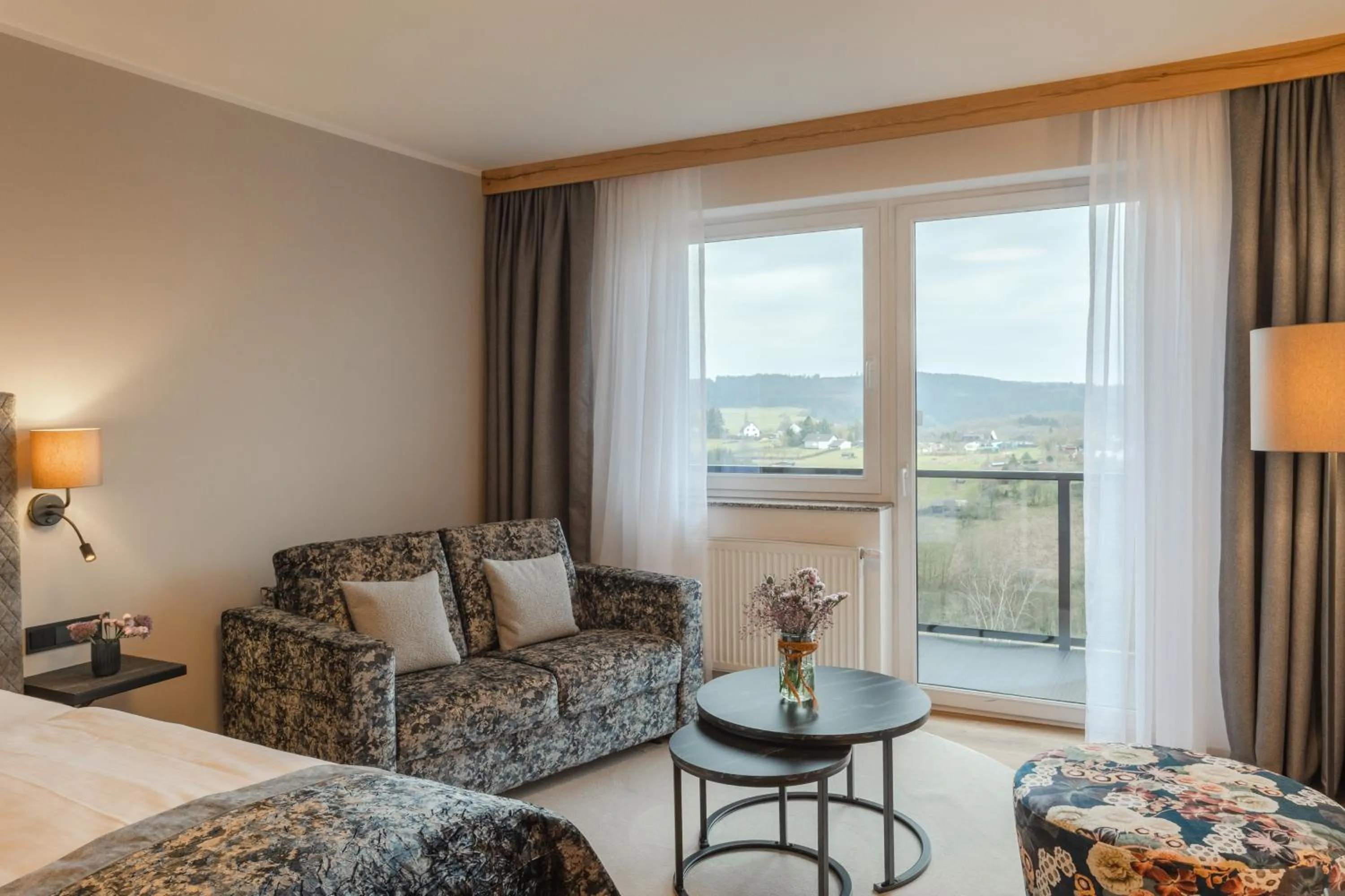 Seating area, Bed in Natur- und Wohlfühlhotel Kastenholz