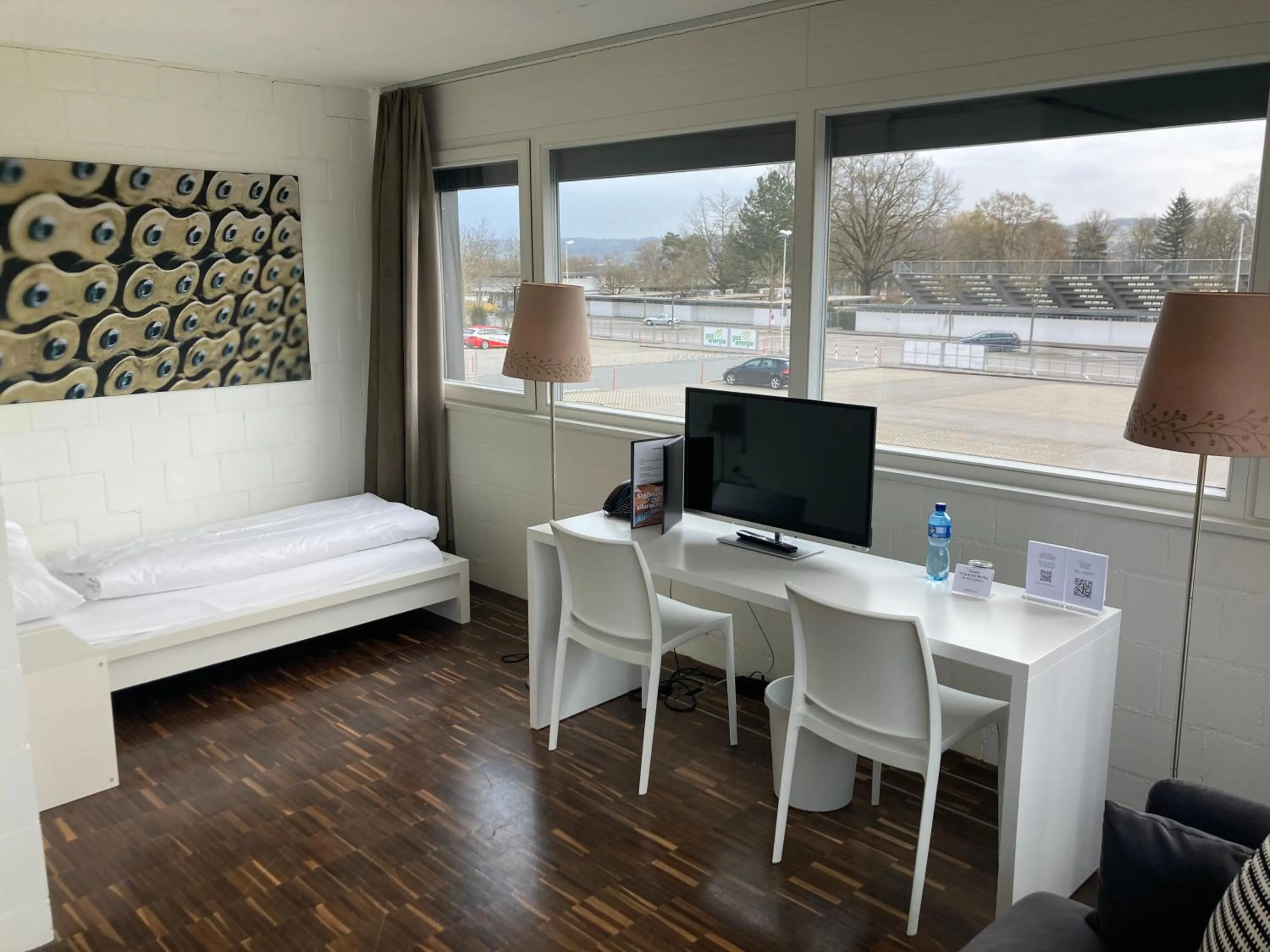 Living room, Bed in Omnium Sport Hotel