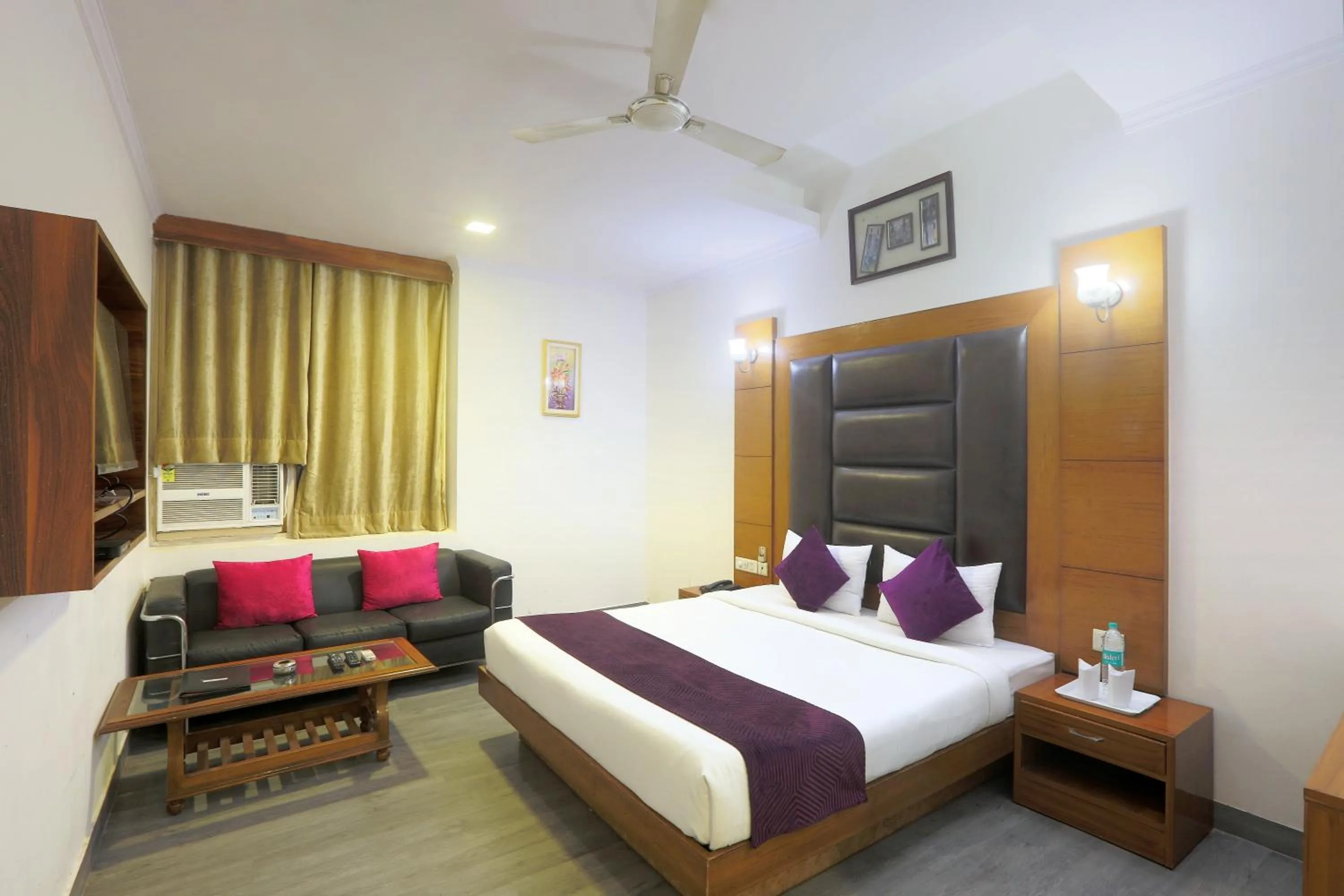 Bedroom in Hotel Castle Blue New Delhi Near IGI Airport