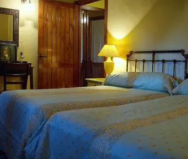 Bed in Apartamentos Rurales La Macera ****