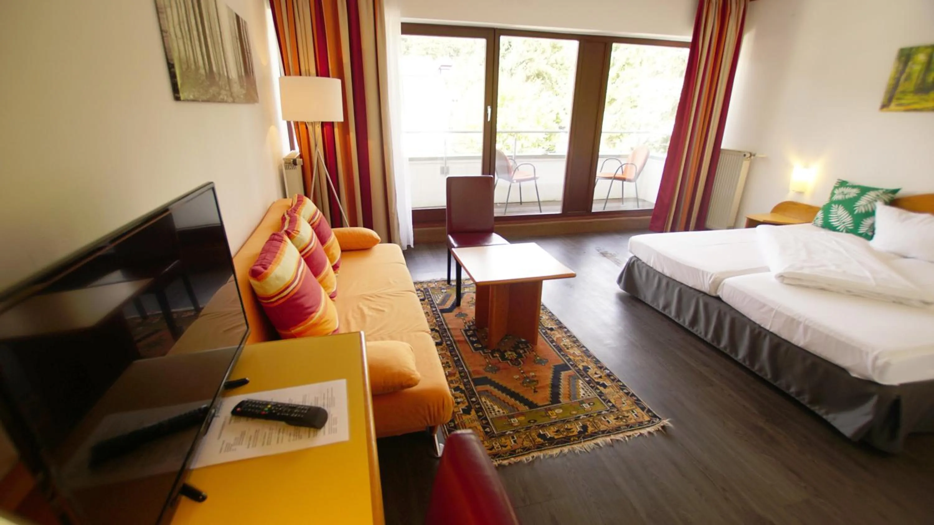 Photo of the whole room, Bed in Hotel Tannenhof Haiger