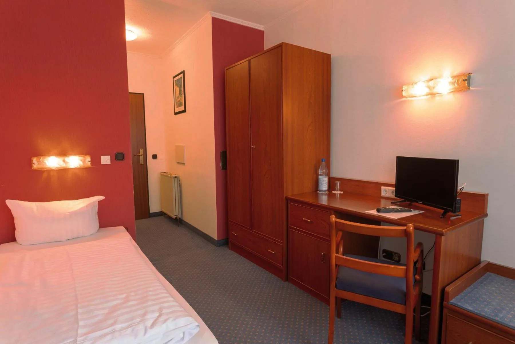 Photo of the whole room, Bed in Hotel Tannenhof Haiger