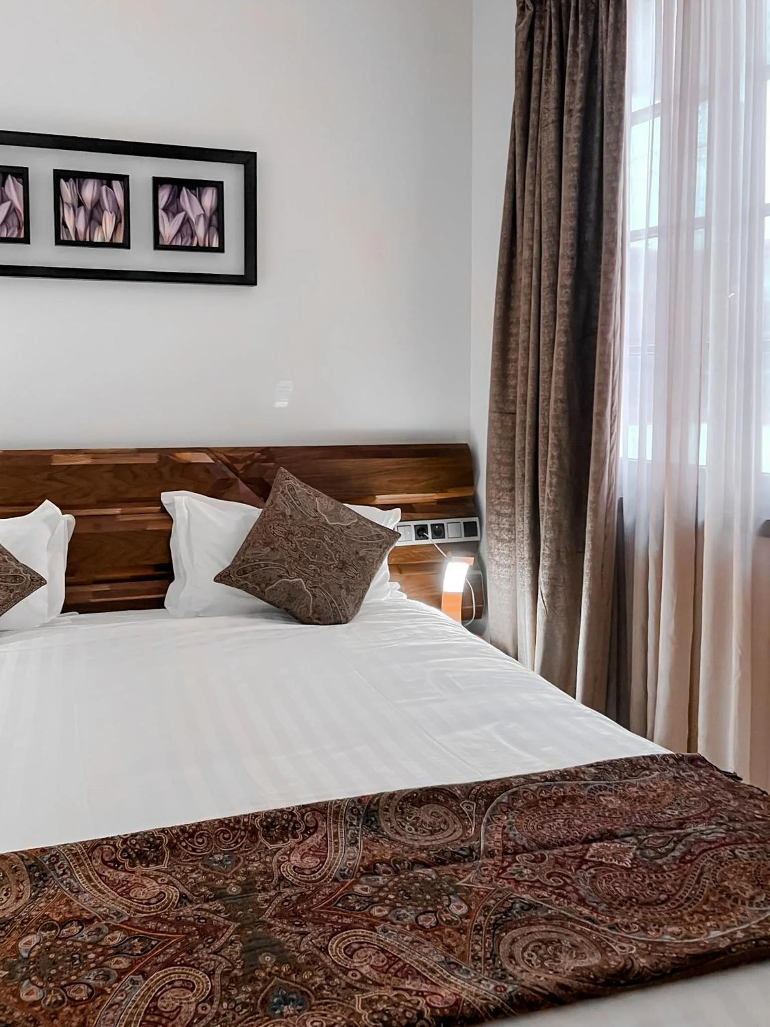 Bed in Anahita Boutique Hotel