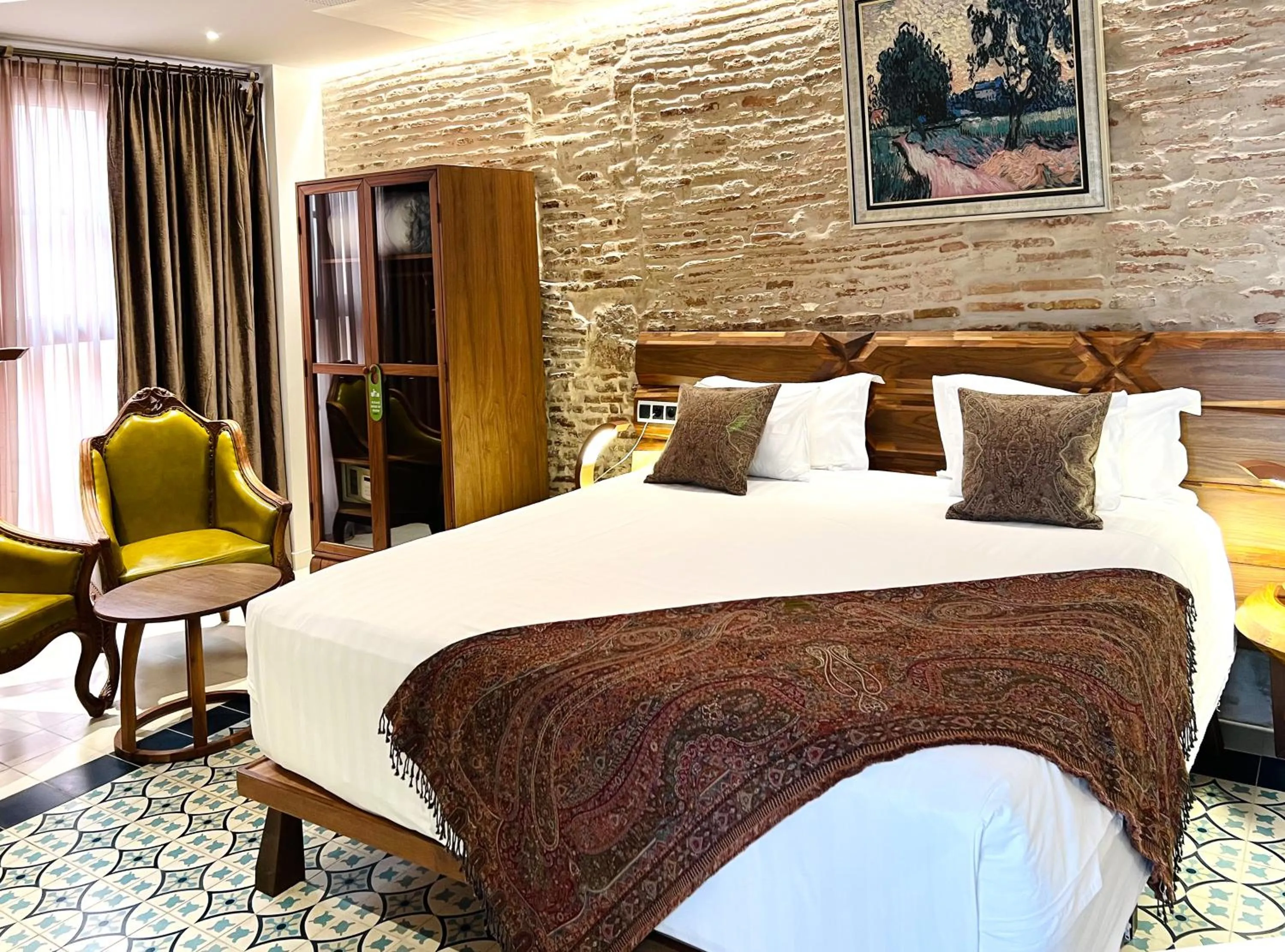 Bed in Anahita Boutique Hotel