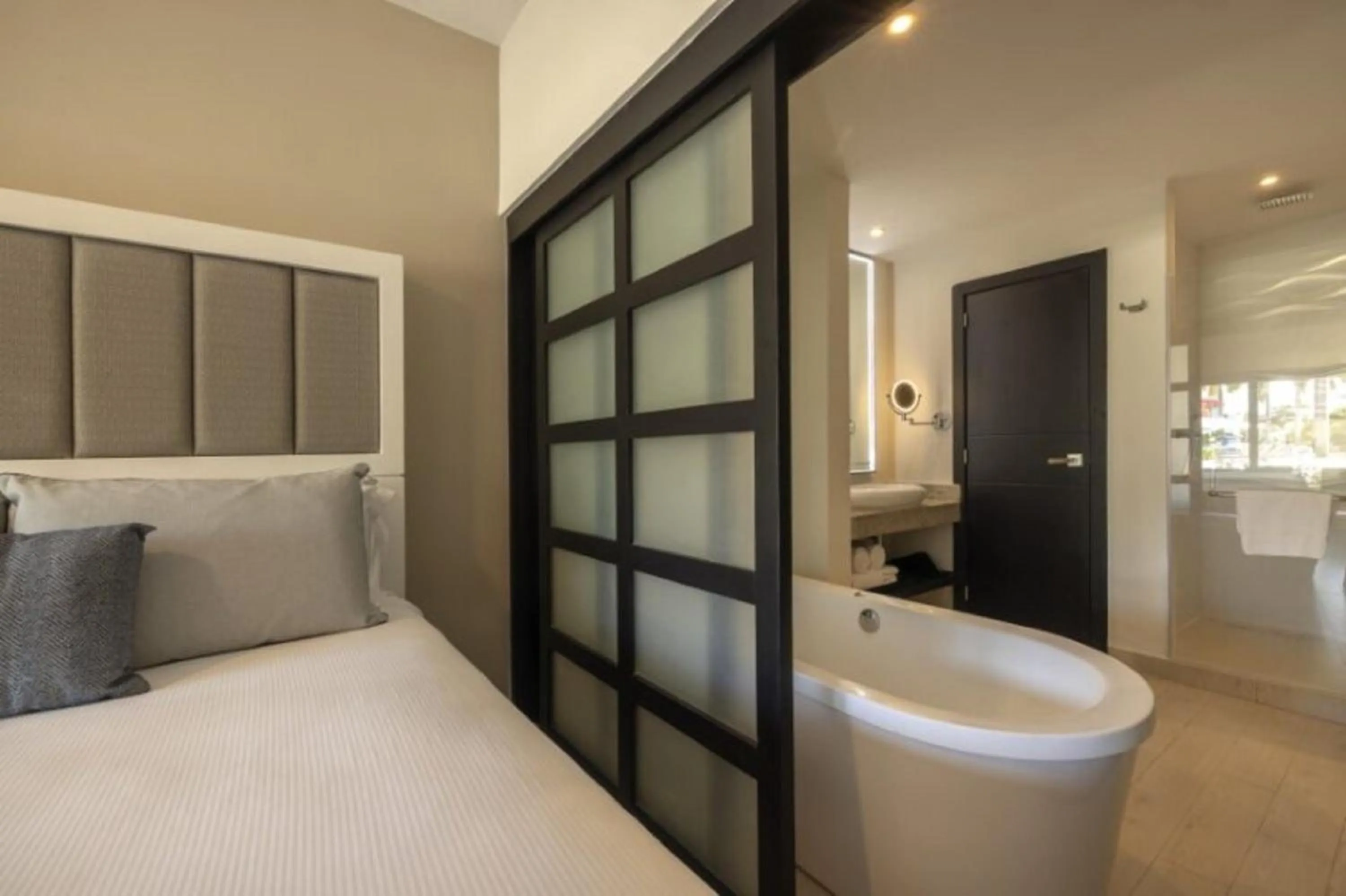 Bathroom, Bed in Royalton Hideaway Blue Waters, An Autograph Collection All-Inclusive Resort - Adults Only