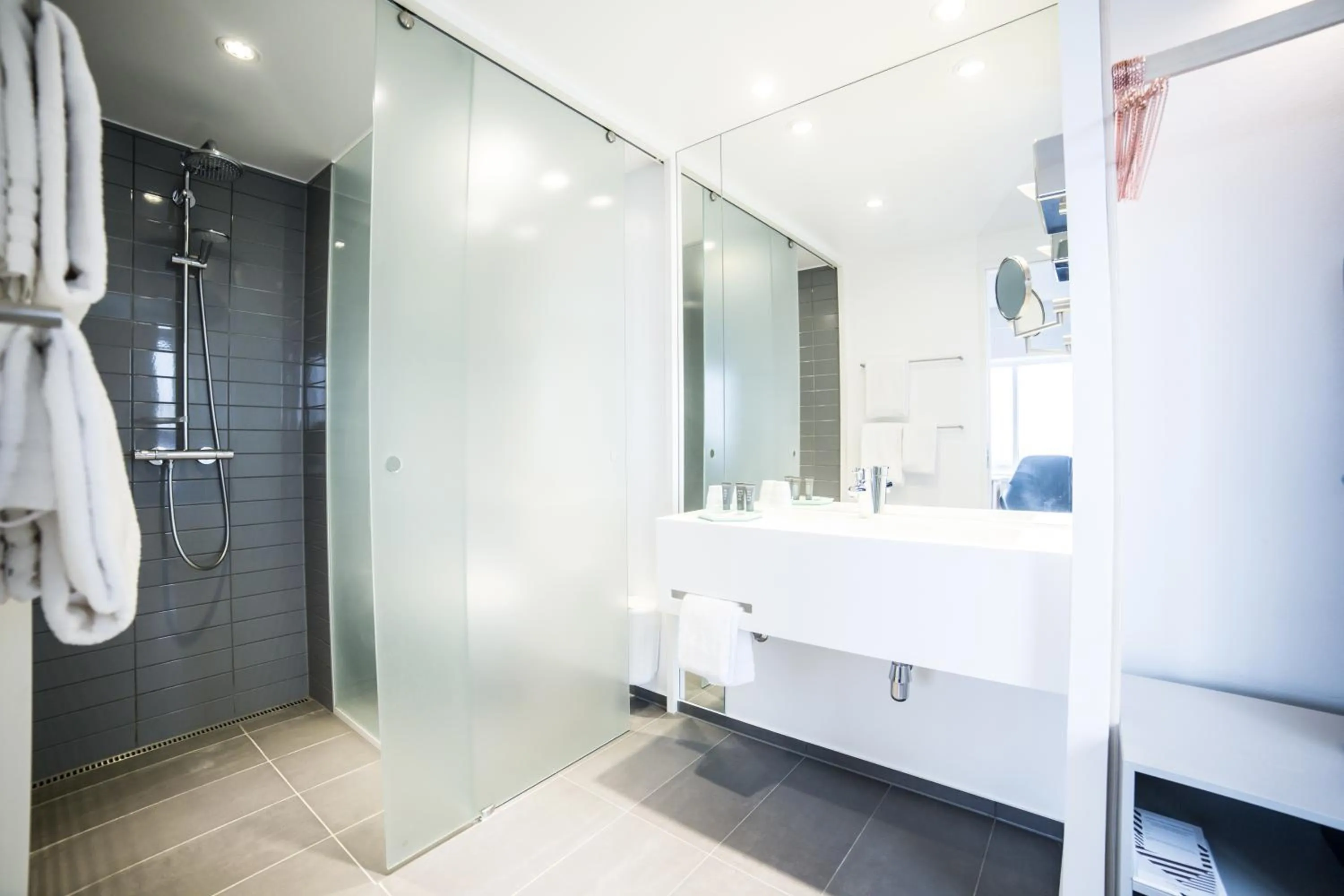 Bathroom in Comwell Aarhus Dolce by Wyndham