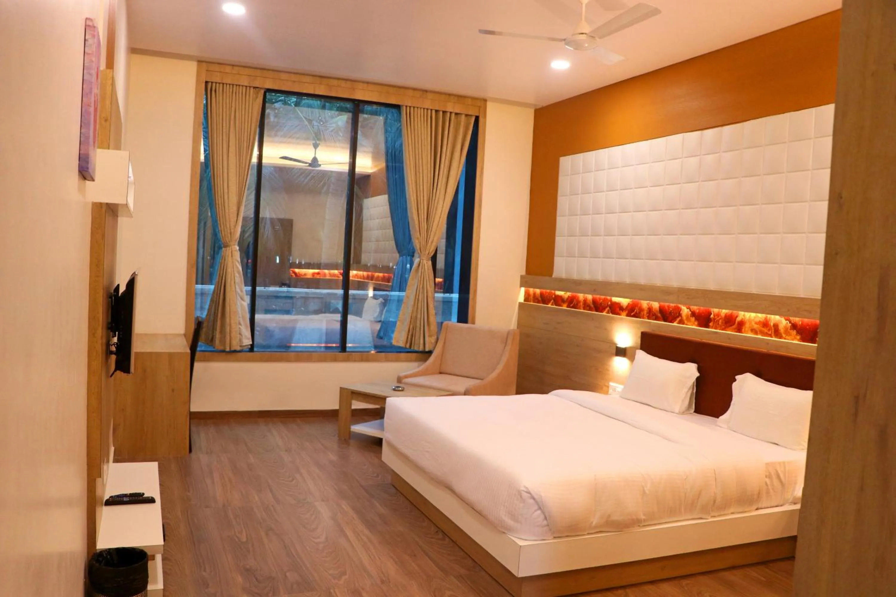 Photo of the whole room, Bed in THE GRAND ASTORIA SOMANTH by Shivalaya Darshanam