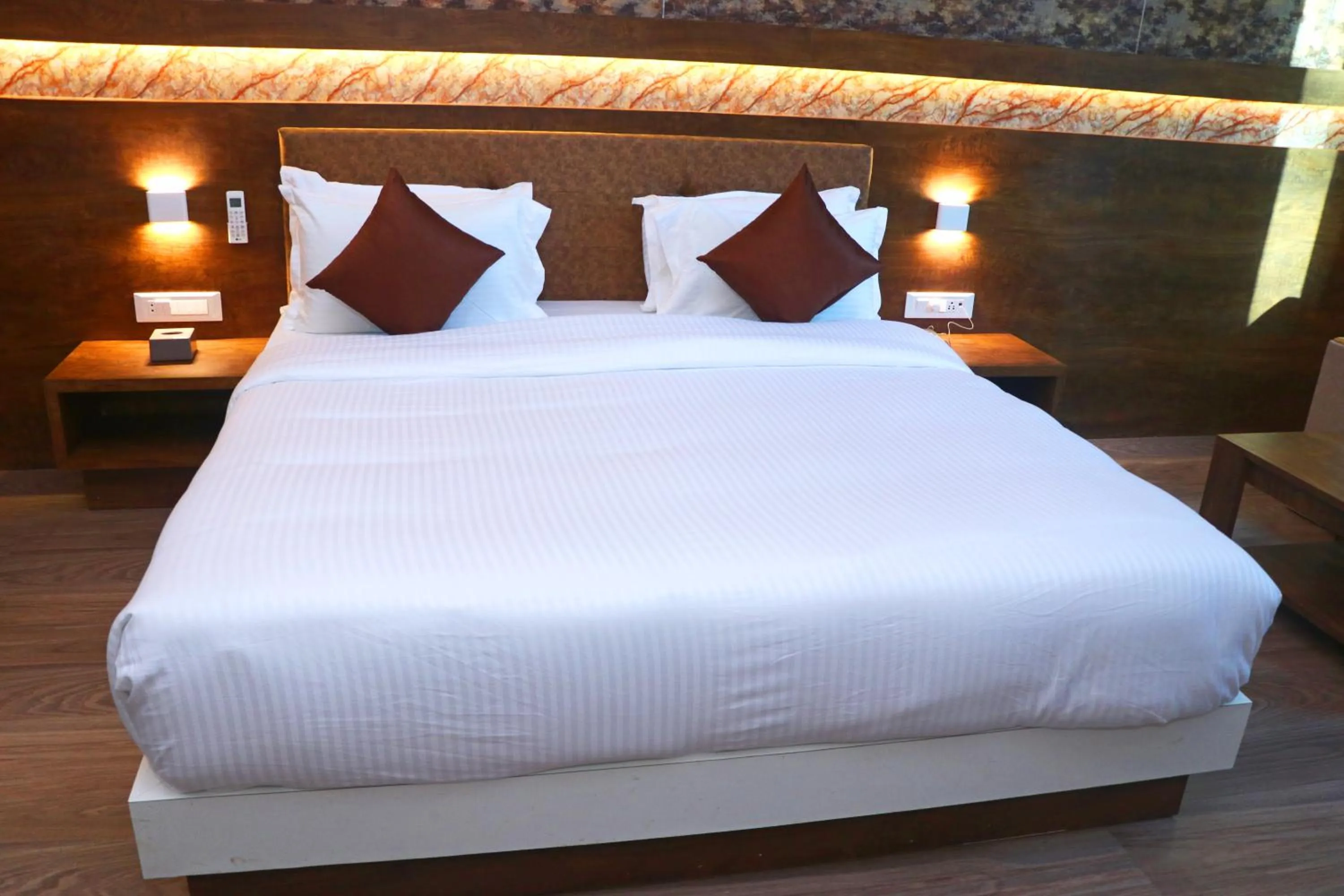 Bed in THE GRAND ASTORIA SOMANTH by Shivalaya Darshanam