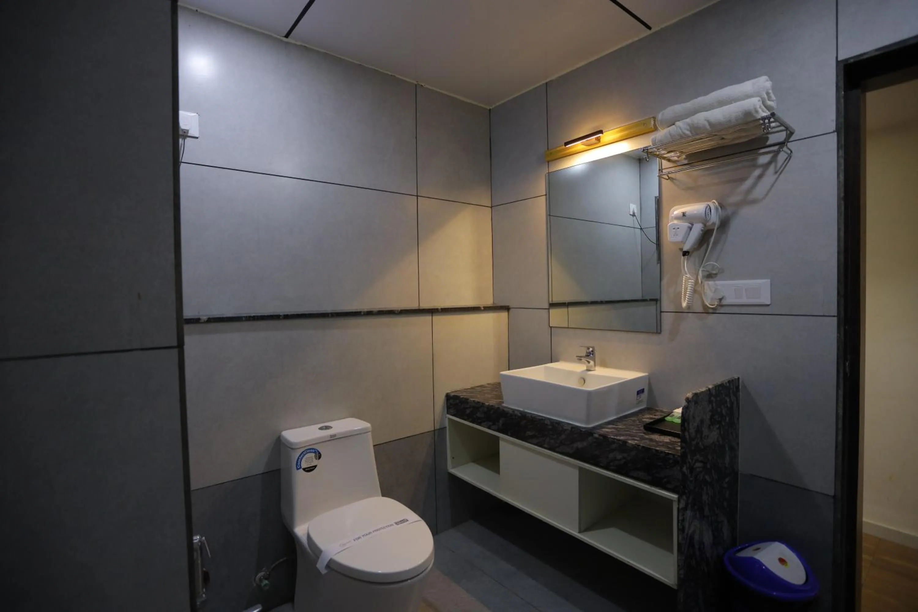 Bathroom in THE GRAND ASTORIA SOMANTH by Shivalaya Darshanam