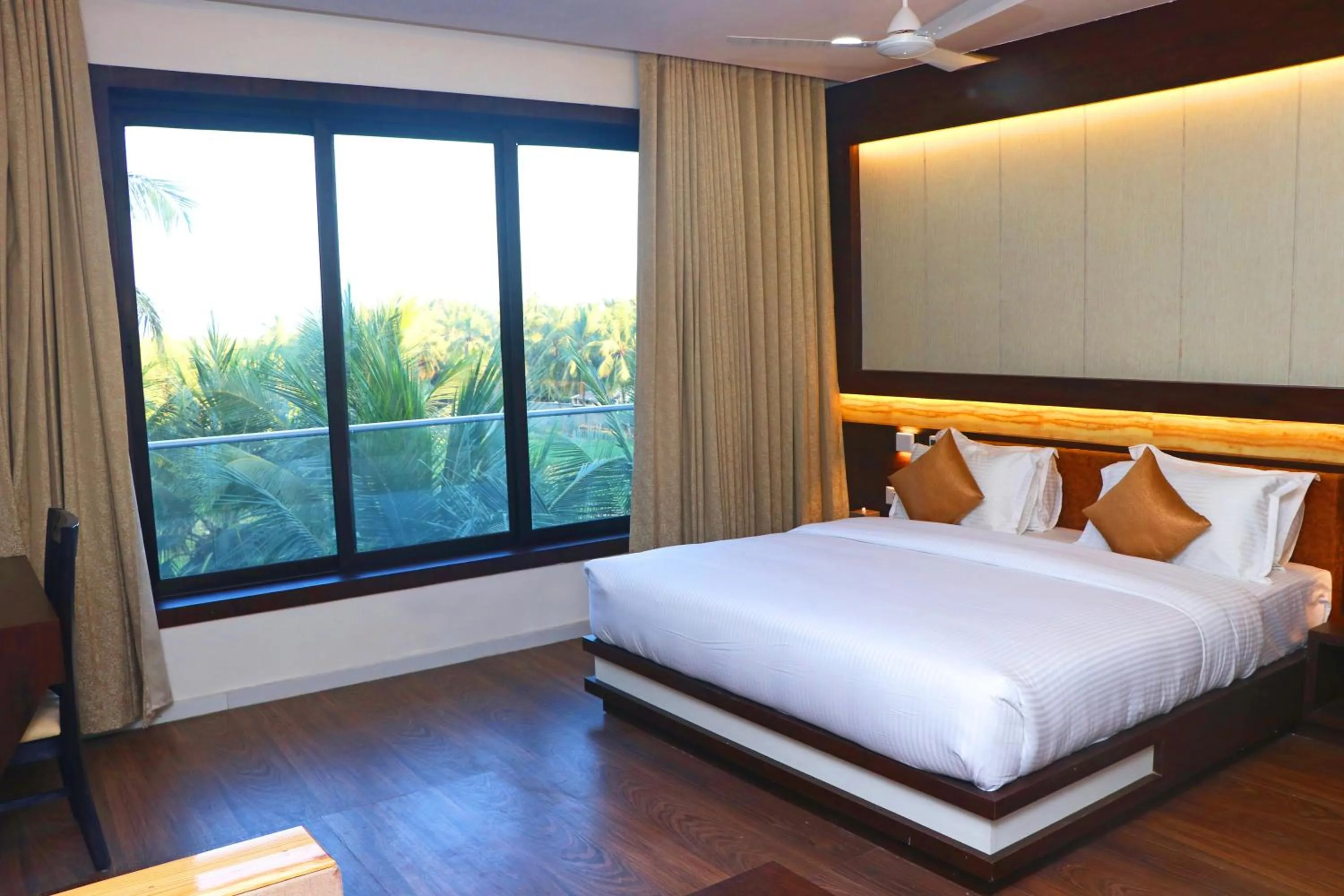 Balcony/Terrace, Bed in THE GRAND ASTORIA SOMANTH by Shivalaya Darshanam