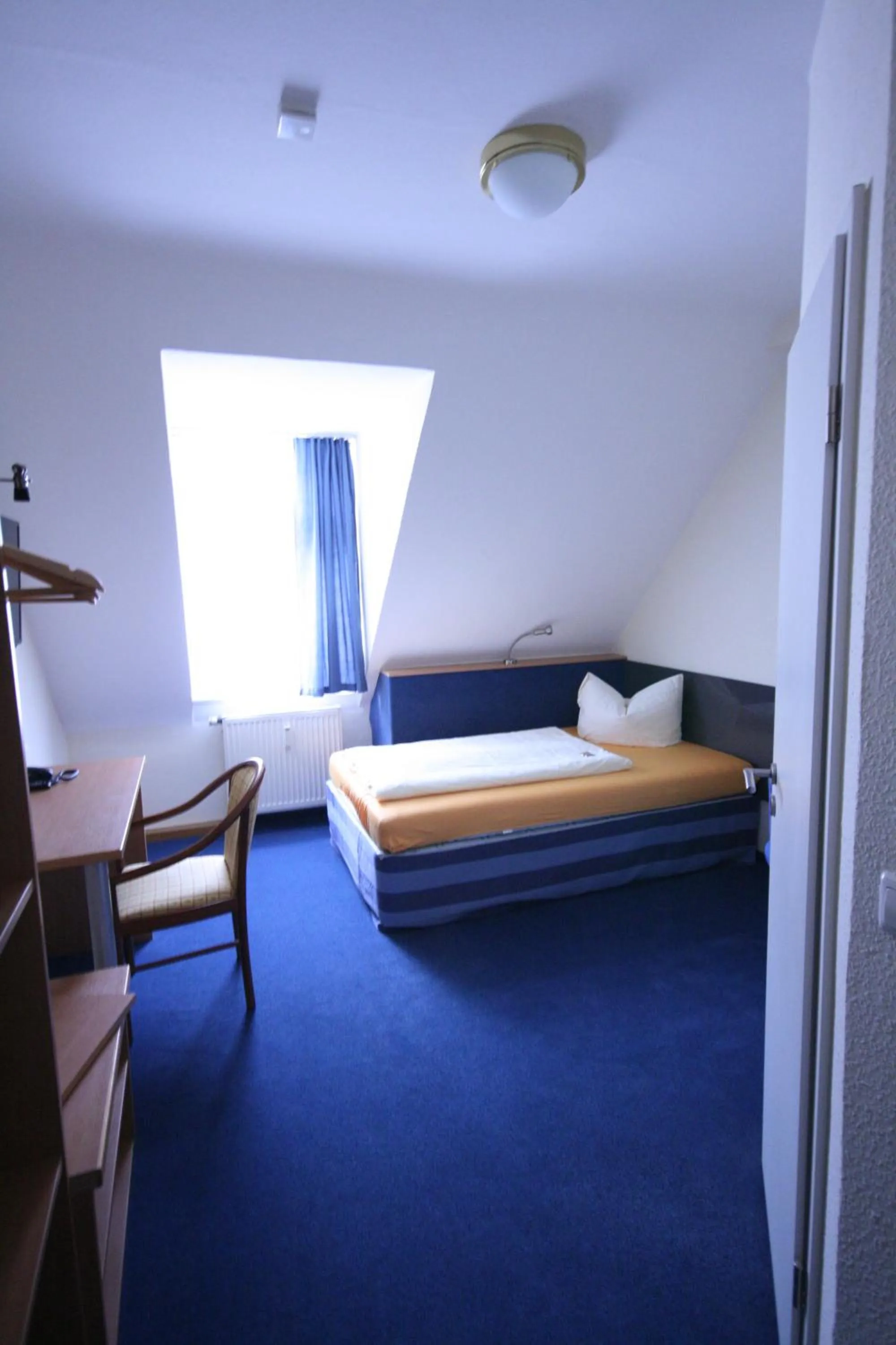 Photo of the whole room, Bed in Altstadt Hotel