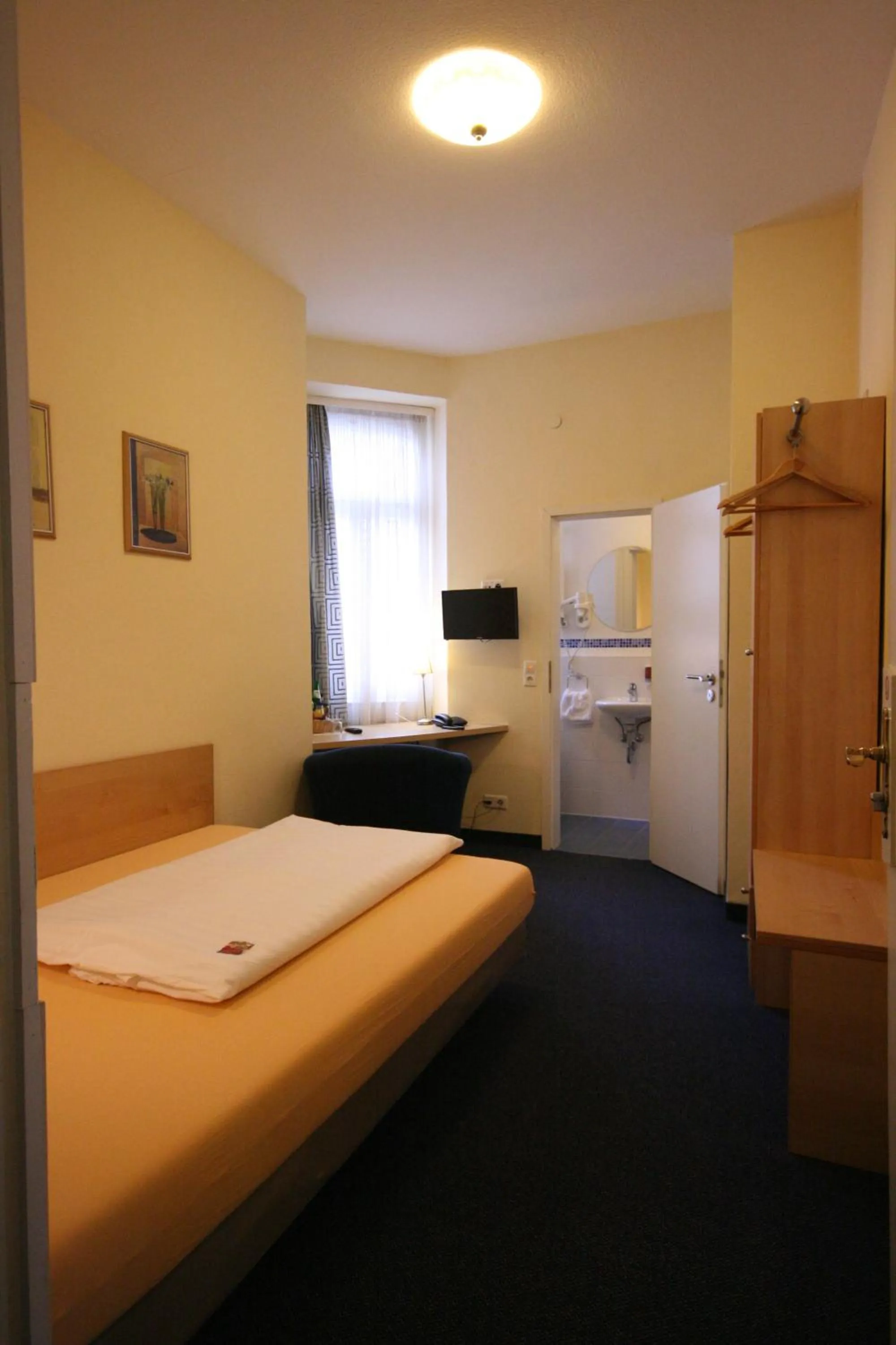 Photo of the whole room, Bed in Altstadt Hotel