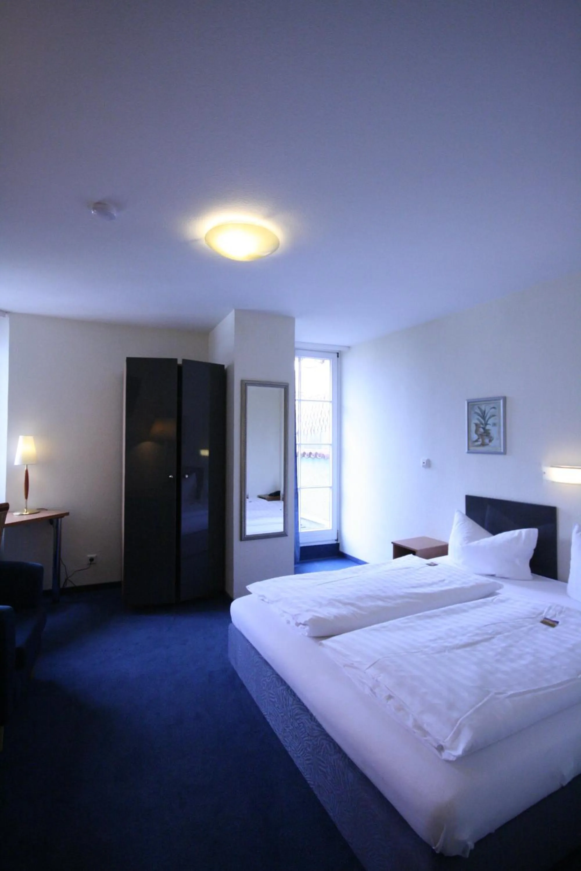Photo of the whole room, Bed in Altstadt Hotel