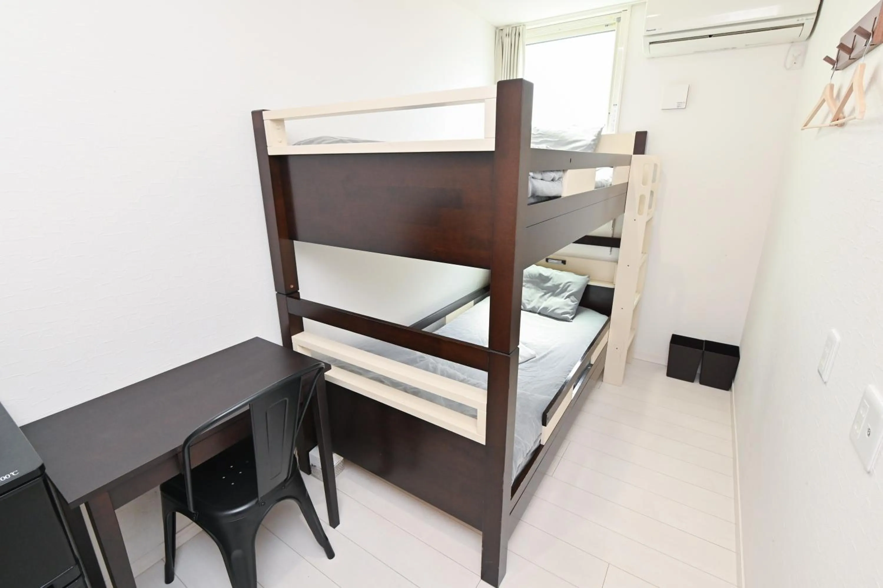 Bed in RUMa INN Rokugoudote