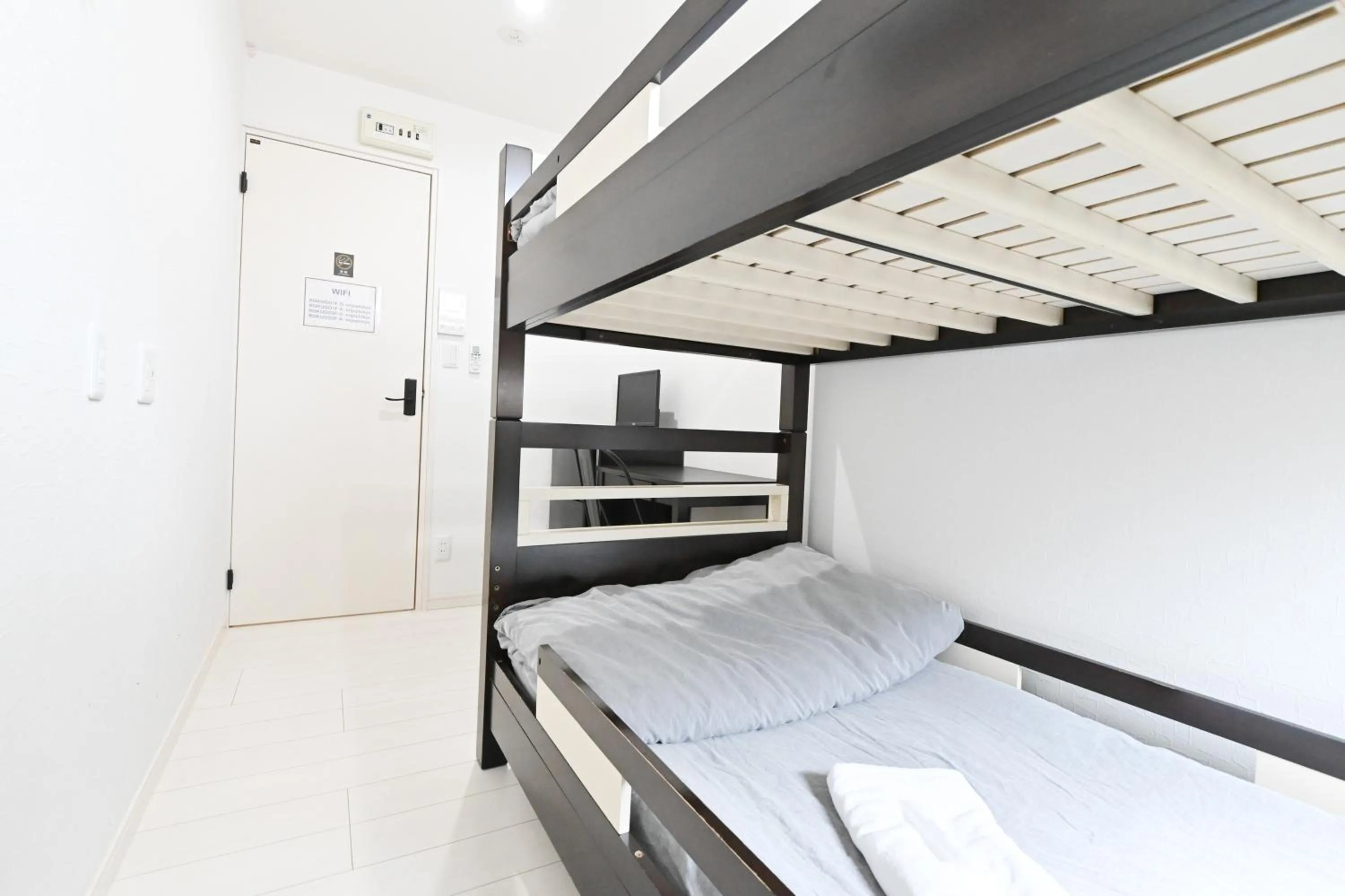 Bed in RUMa INN Rokugoudote