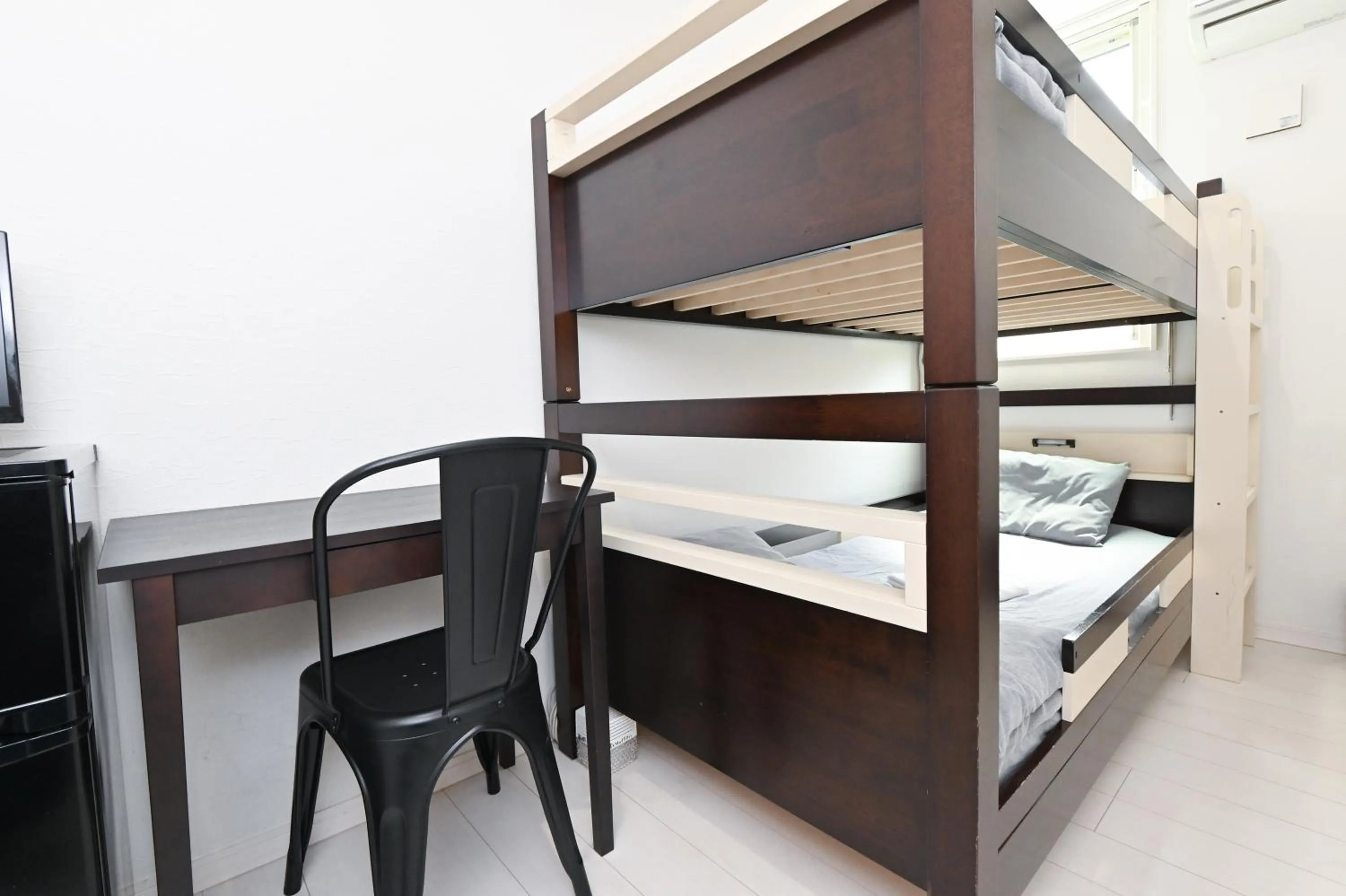 Bed in RUMa INN Rokugoudote