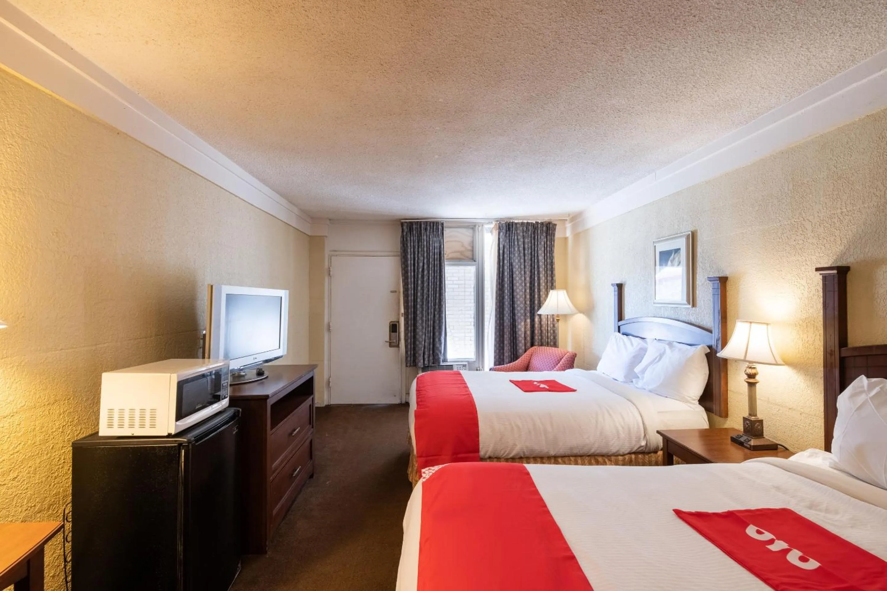 Bedroom, TV/Entertainment Center in Hotel O Bay City, TX-35