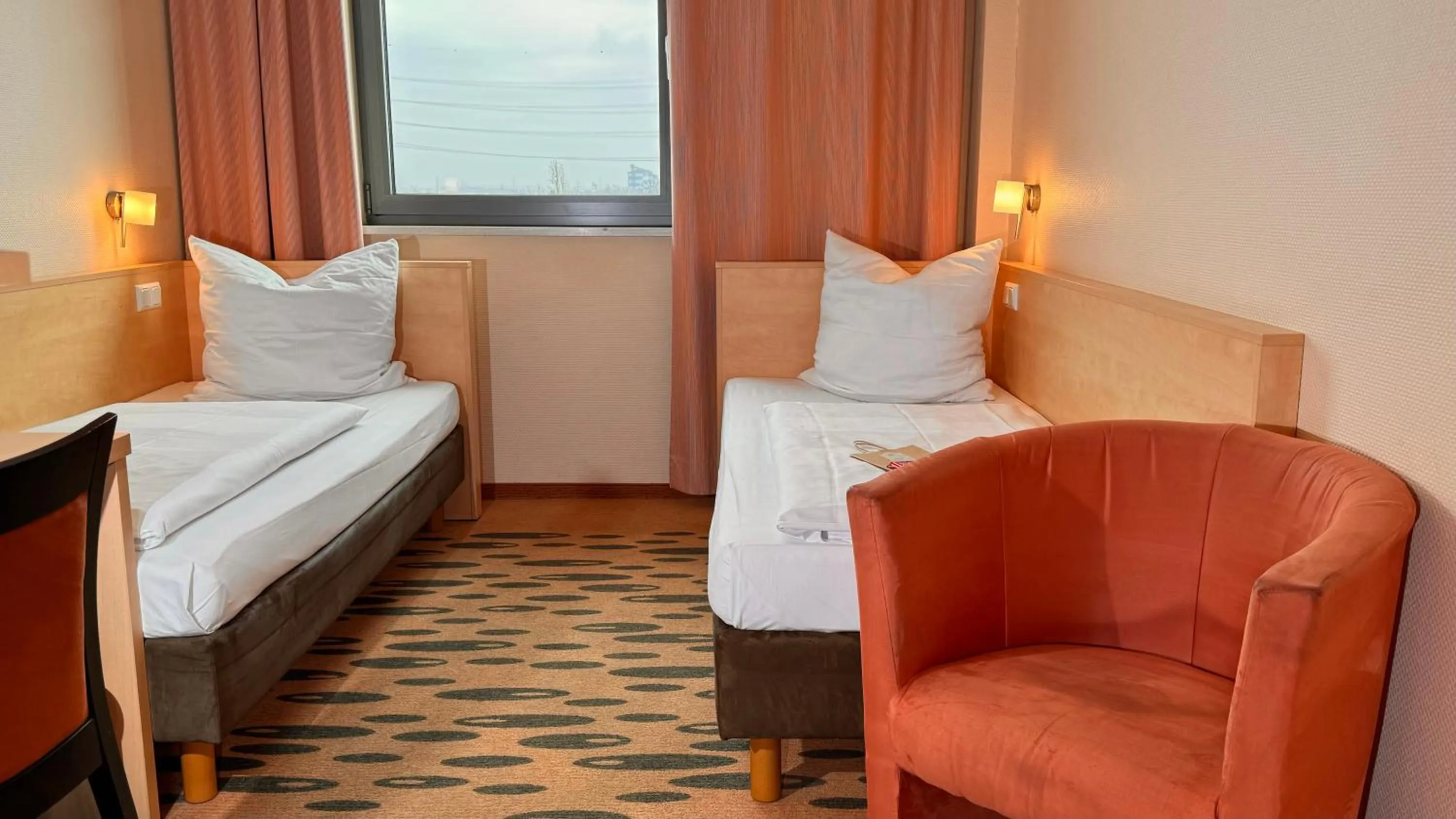 Photo of the whole room, Bed in Hotel Rhein-Ruhr Bottrop