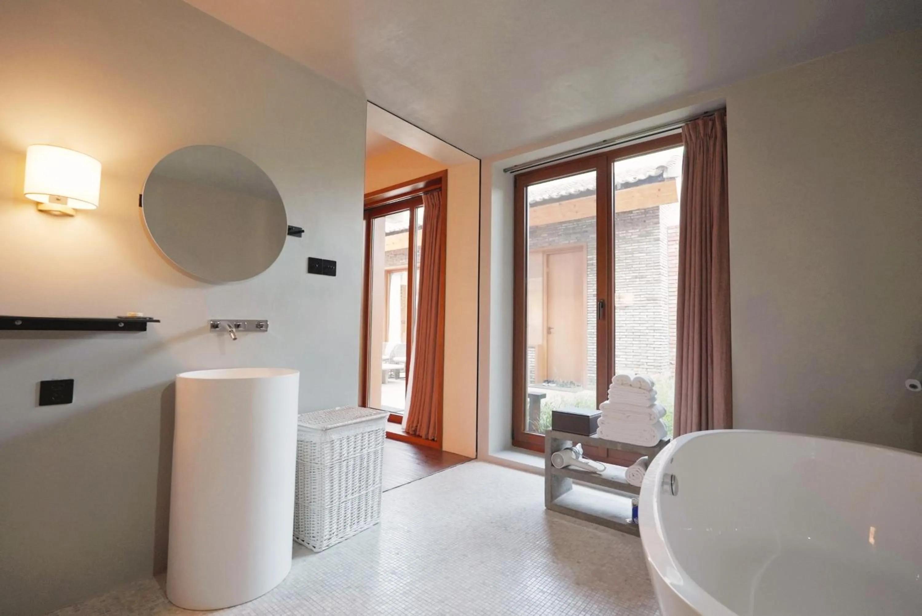 Bathroom in Sansa Village Boutique Hotel at Mutianyu Great Wall Adjoin to Mutianyu Great Wall - Room with the View of Great Wall - Jacuzzi with the View of Great Wall - Vehicle Shuttle Service - International Catering - SPA& Nail Beauty Facilities