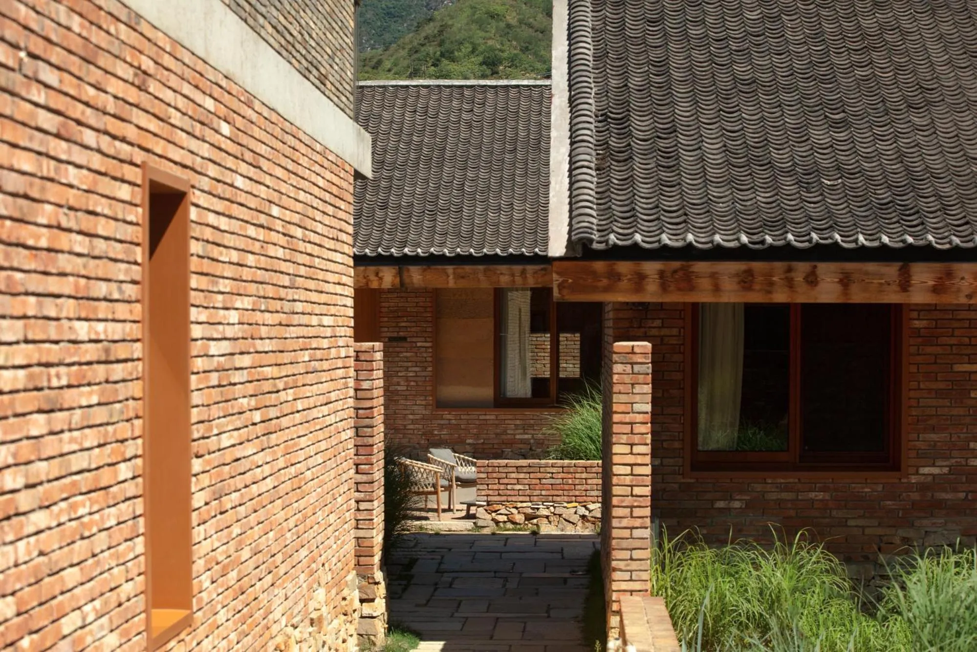 Property building in Sansa Village Boutique Hotel at Mutianyu Great Wall Adjoin to Mutianyu Great Wall - Room with the View of Great Wall - Jacuzzi with the View of Great Wall - Vehicle Shuttle Service - International Catering - SPA& Nail Beauty Facilities