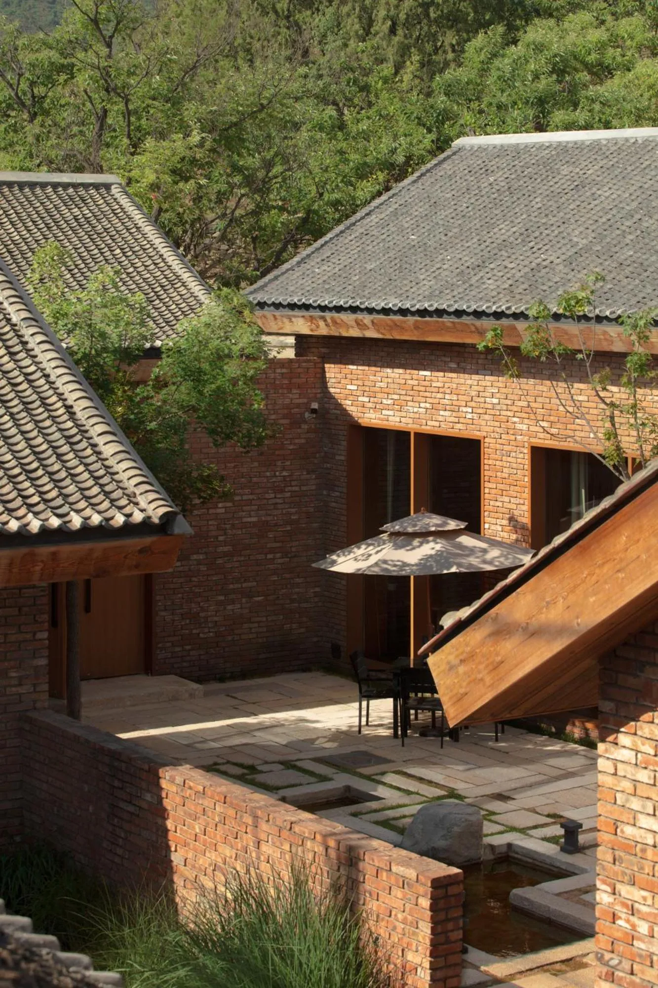 Property building in Sansa Village Boutique Hotel at Mutianyu Great Wall Adjoin to Mutianyu Great Wall - Room with the View of Great Wall - Jacuzzi with the View of Great Wall - Vehicle Shuttle Service - International Catering - SPA& Nail Beauty Facilities