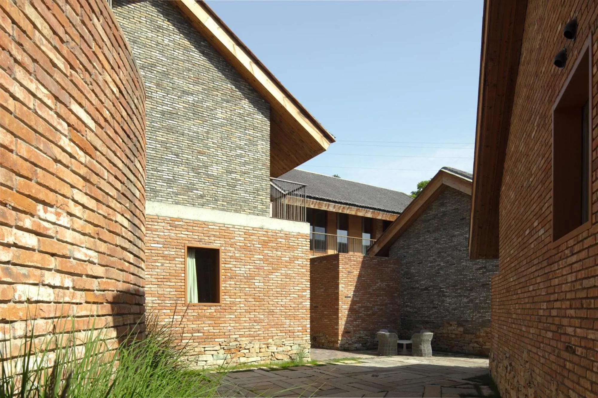 Property building in Sansa Village Boutique Hotel at Mutianyu Great Wall Adjoin to Mutianyu Great Wall - Room with the View of Great Wall - Jacuzzi with the View of Great Wall - Vehicle Shuttle Service - International Catering - SPA& Nail Beauty Facilities