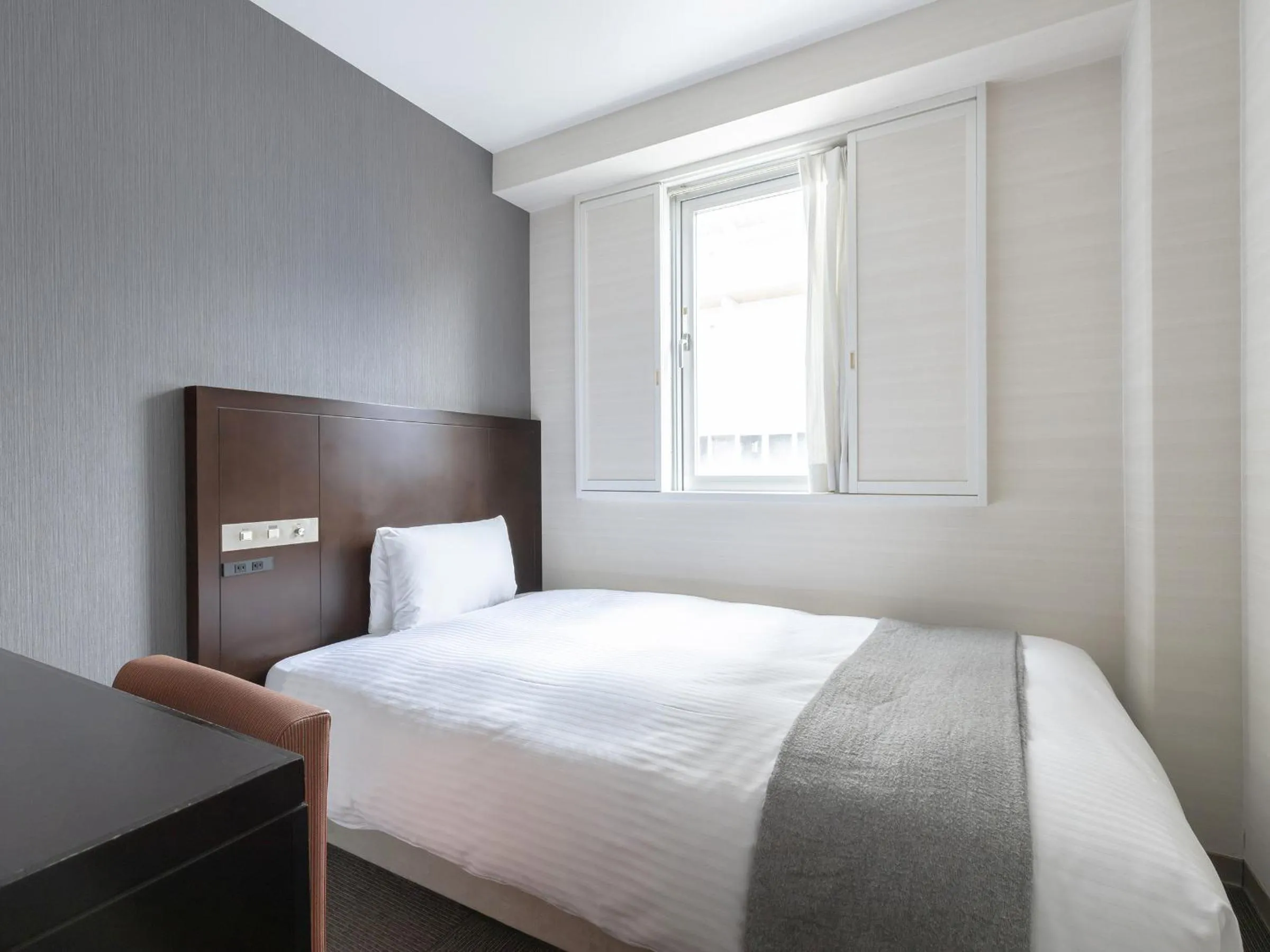 Bed in Vessel Inn Hiroshima Station