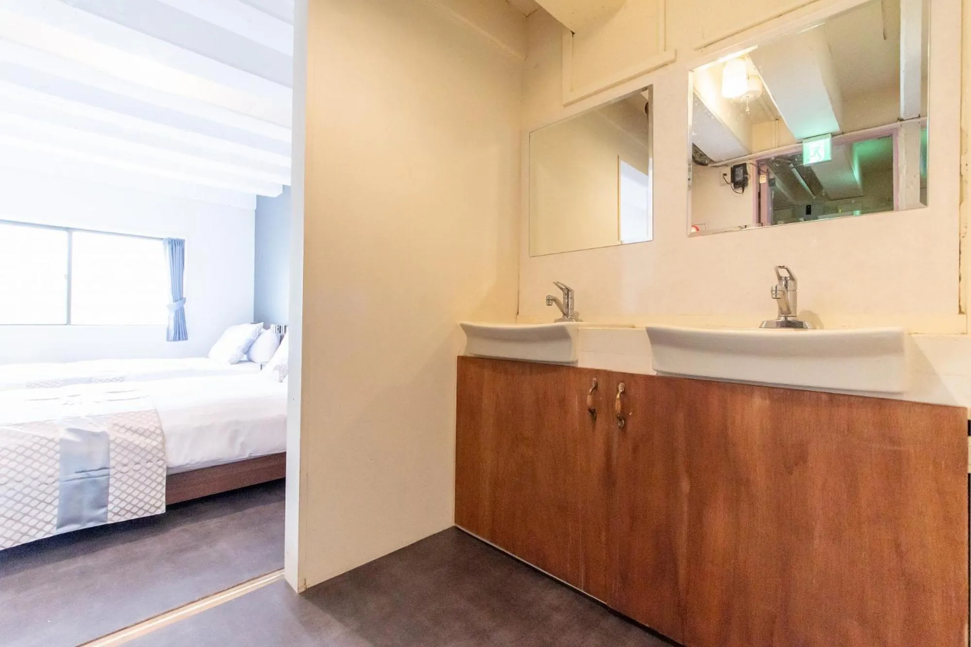 Bed in LUANAHOTEL IN NAKANO