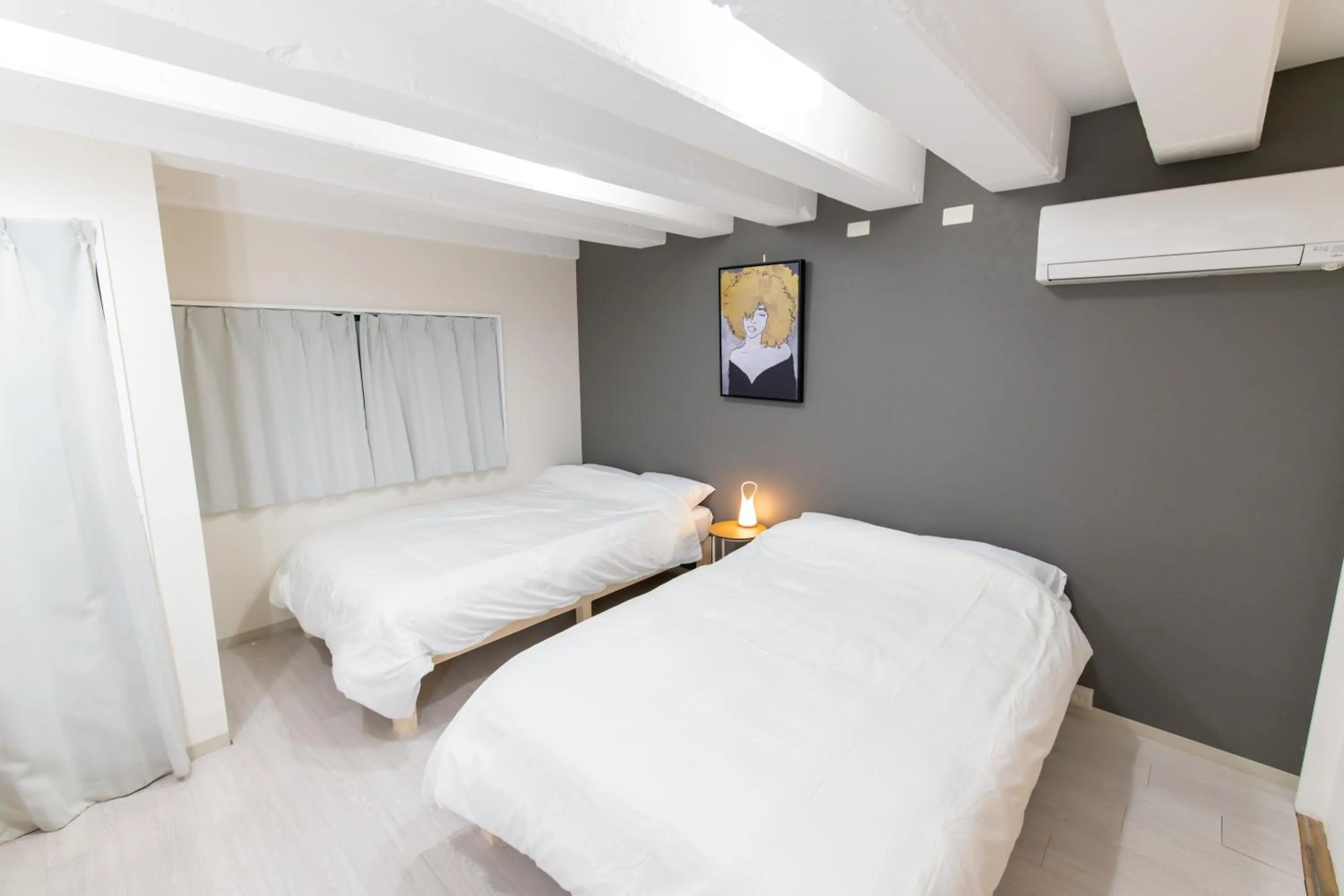 Bed in LUANAHOTEL IN NAKANO