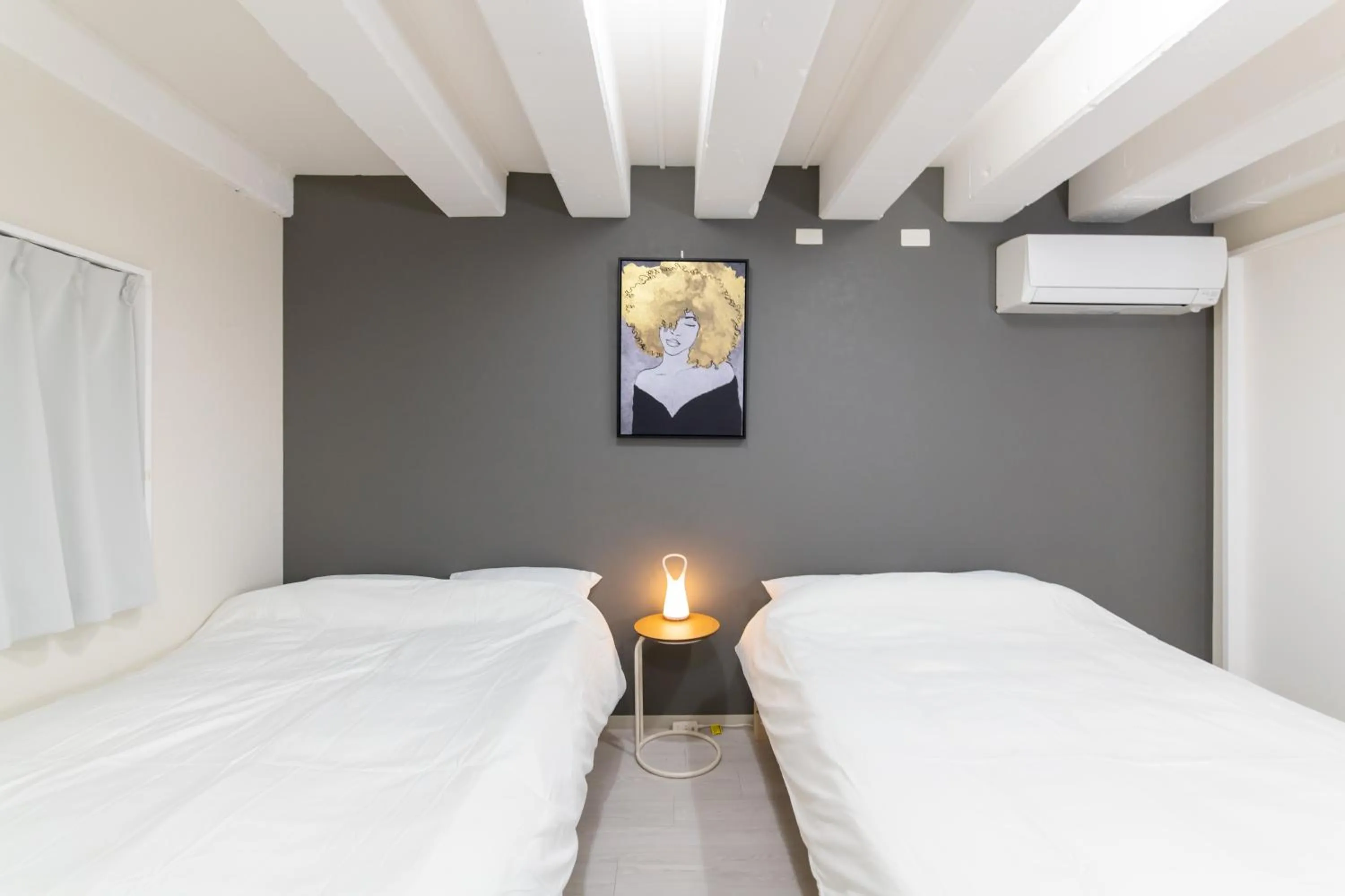 Bed in LUANAHOTEL IN NAKANO