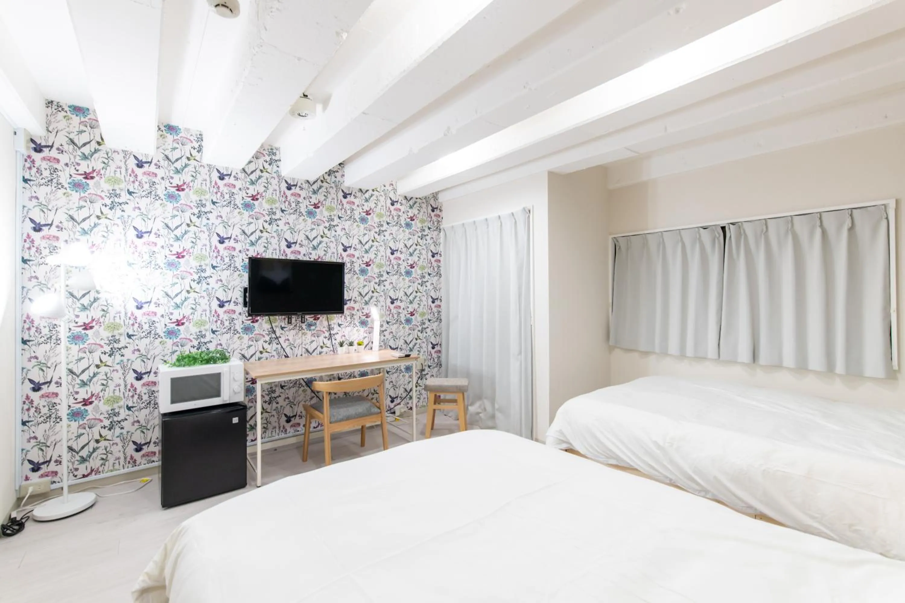 Bed in LUANAHOTEL IN NAKANO