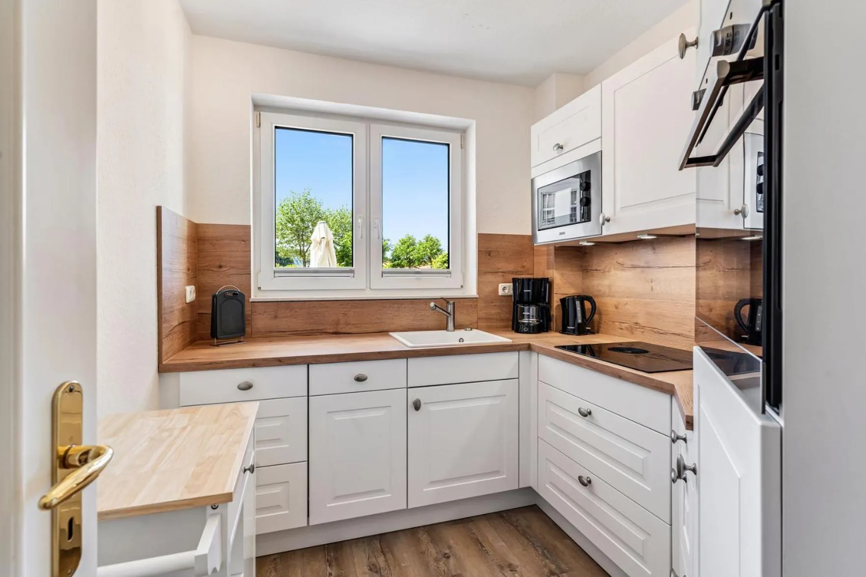Kitchen or kitchenette in Strandhotel Glücksburg